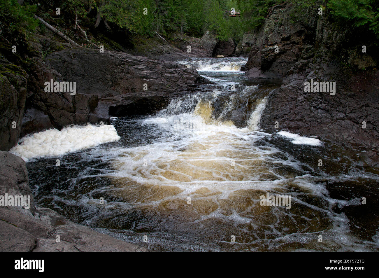 Scenic of waterfall through boreal forest of Cascade River State Park, northern Minnesota. Stock Photo