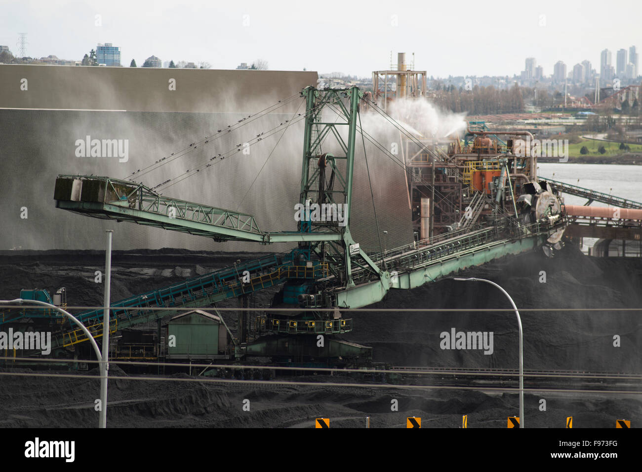 Coal stacker/reclaimer at Neptune Terminals. North Vancouver, British Columbia, Canada. Stock Photo