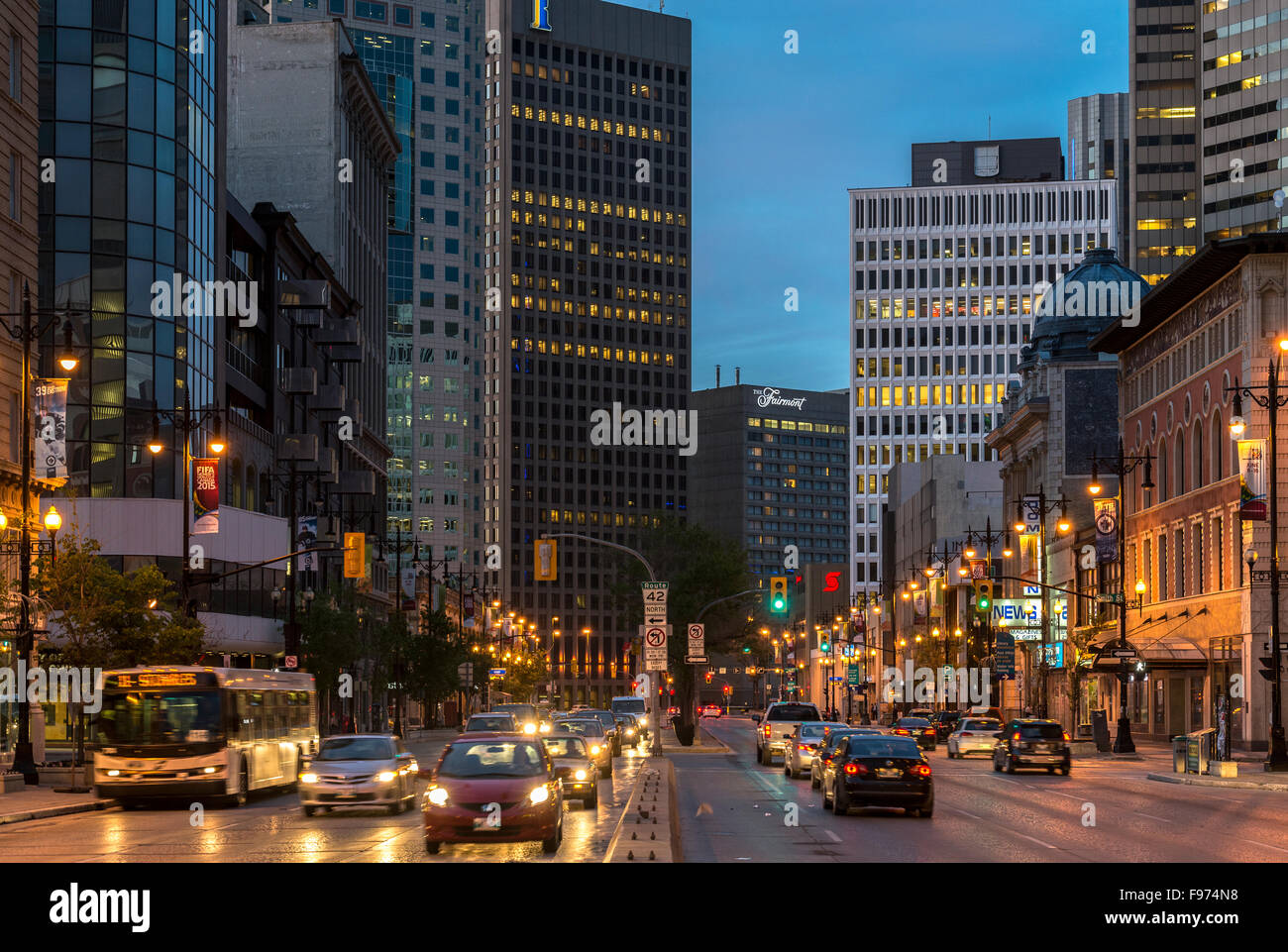 Portage Avenue at night, Downtown Winnipeg, Manitoba, Canada Stock Photo