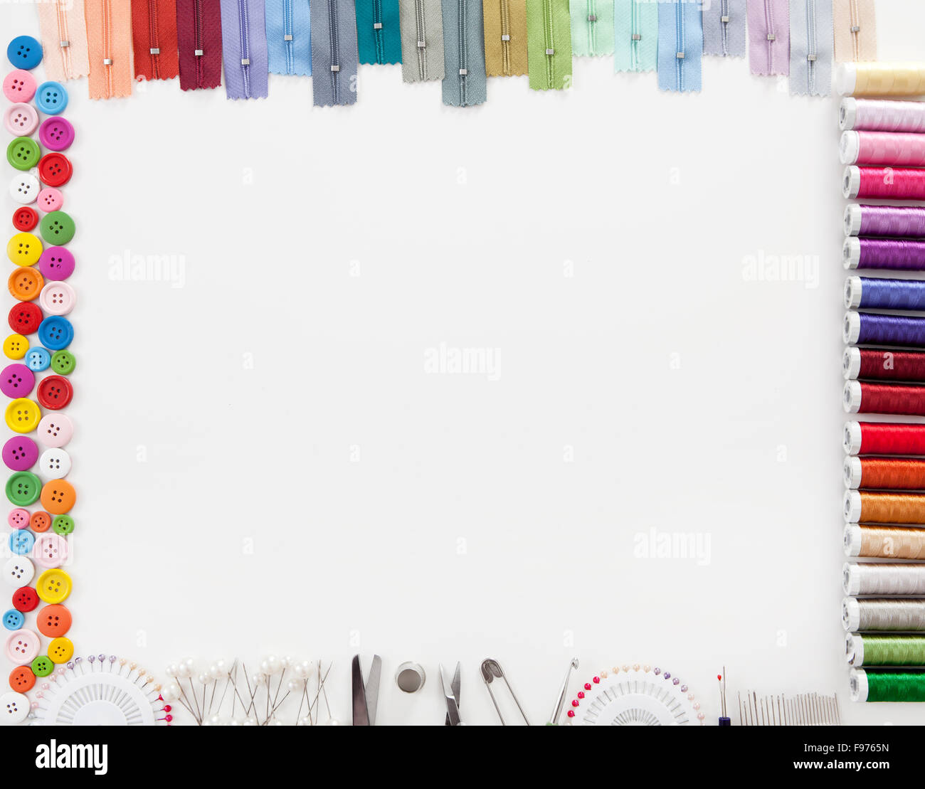 Different colorful accessories to tailor with white space for text in the middle Stock Photo