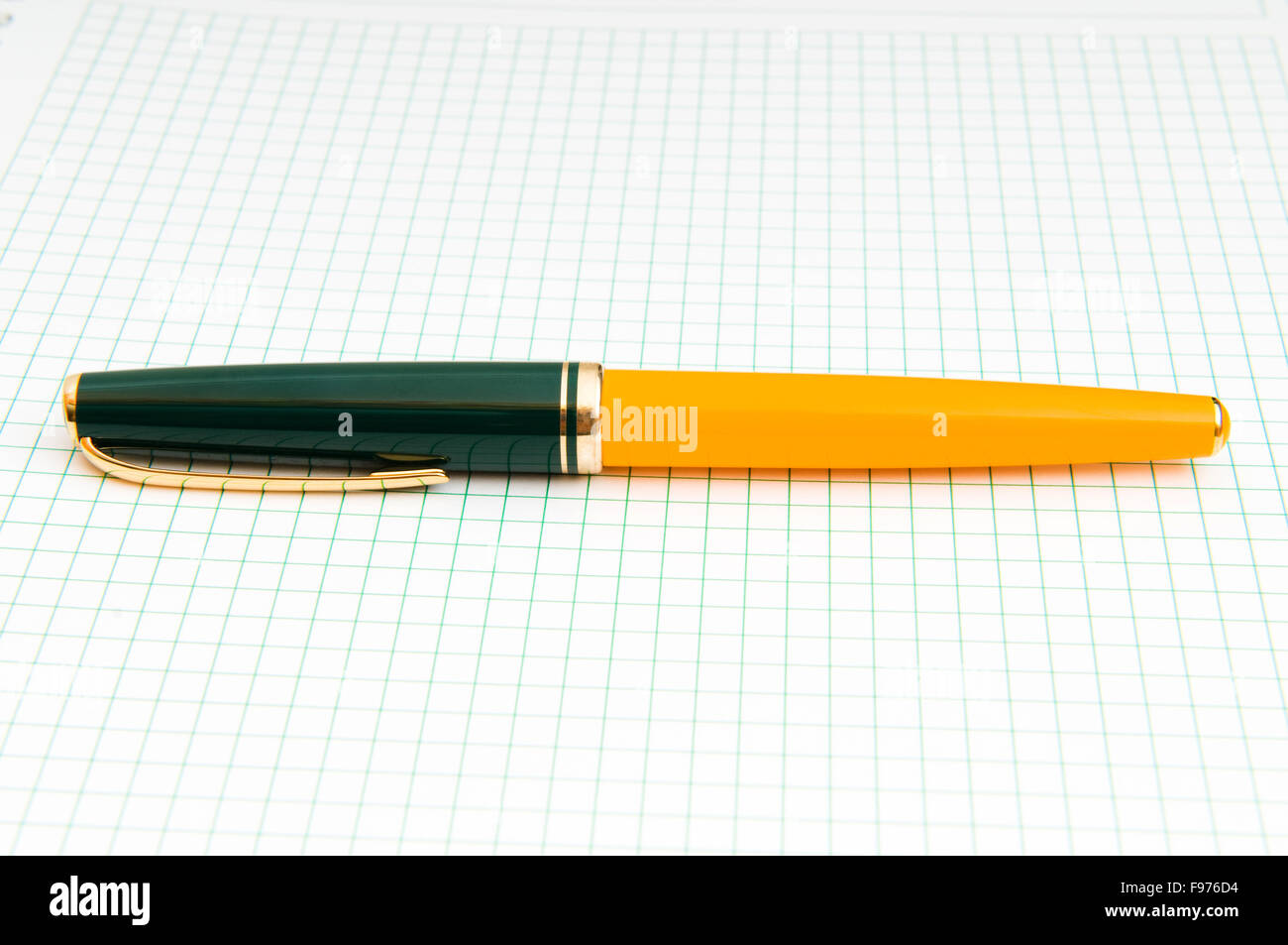 Writing pen on the blank page Stock Photo - Alamy
