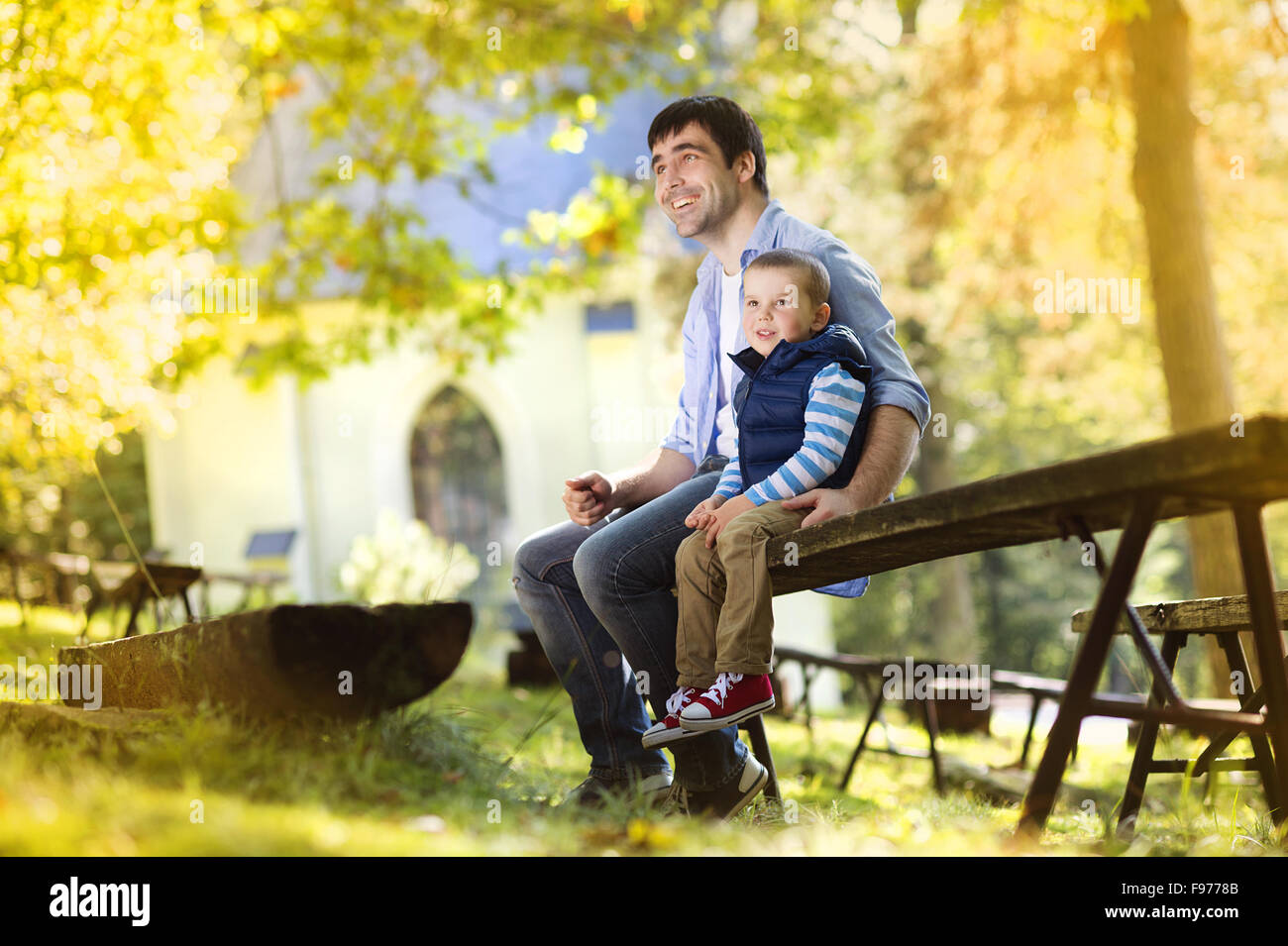 Father and son spending time together in summer nature Stock Photo
