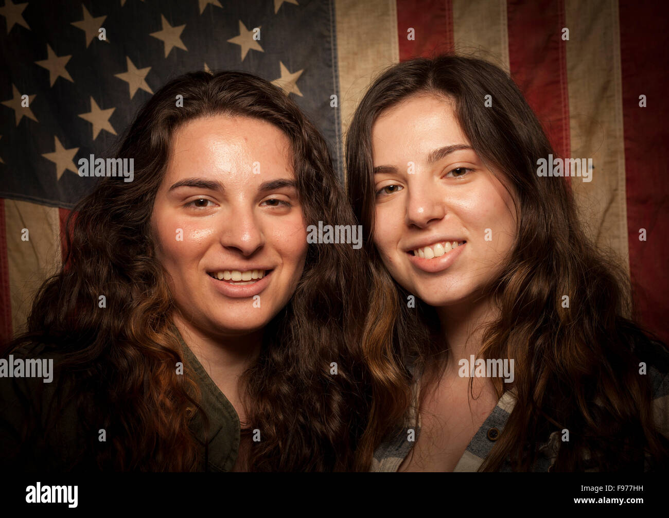 Sisters pose for a portrait as first time voters in the November 2012 United States Presidential Election for a project on new amercian voters. Stock Photo