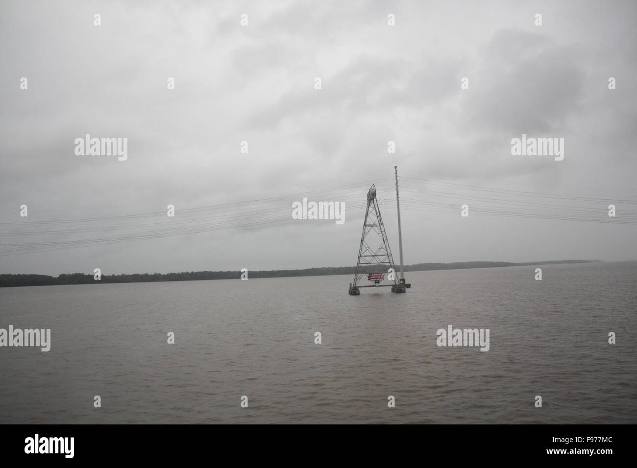 Electricity pylons in water hires stock photography and images Alamy