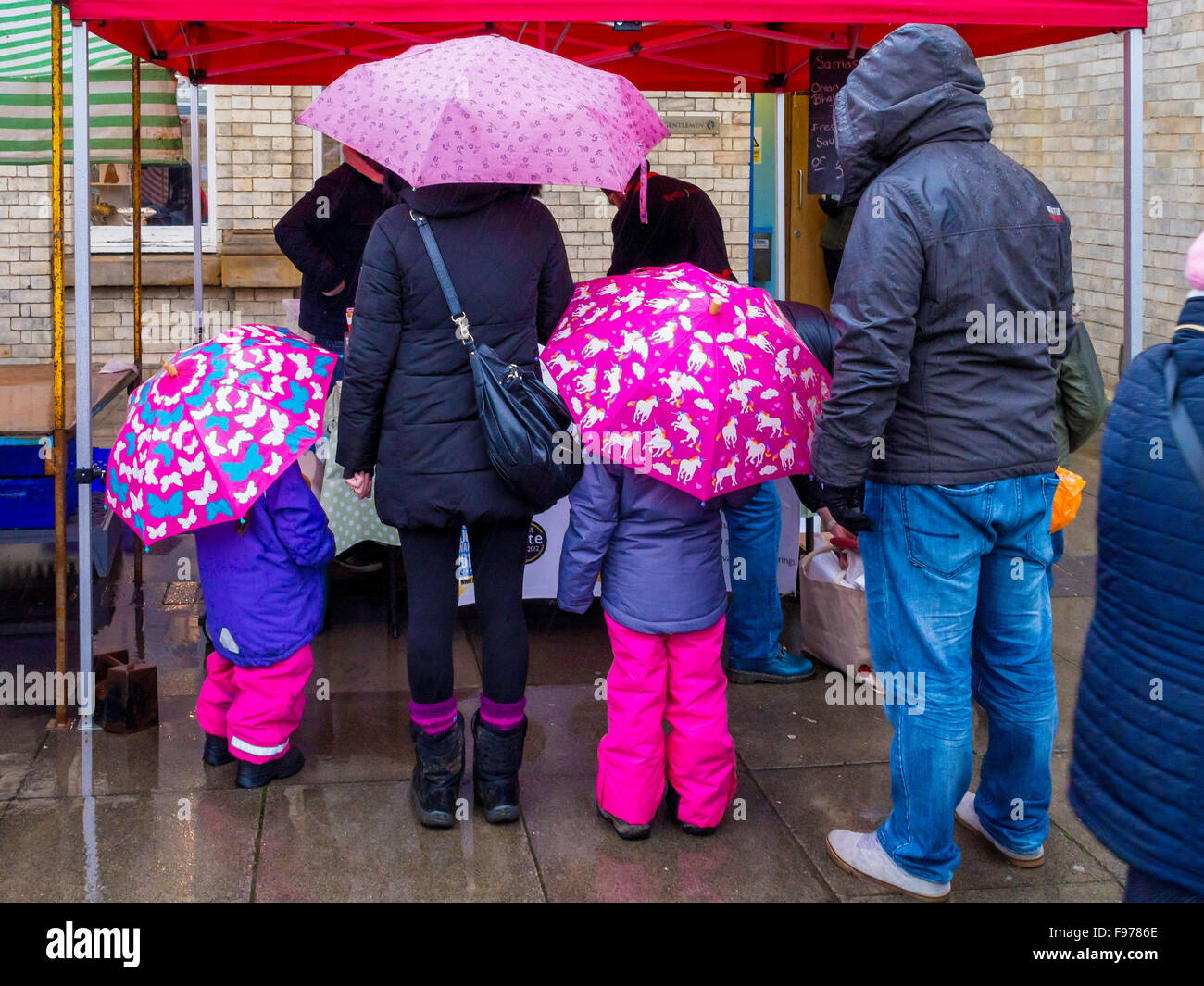 Rainy Day at Saltburn Farmer's Market Woman and Children at a market