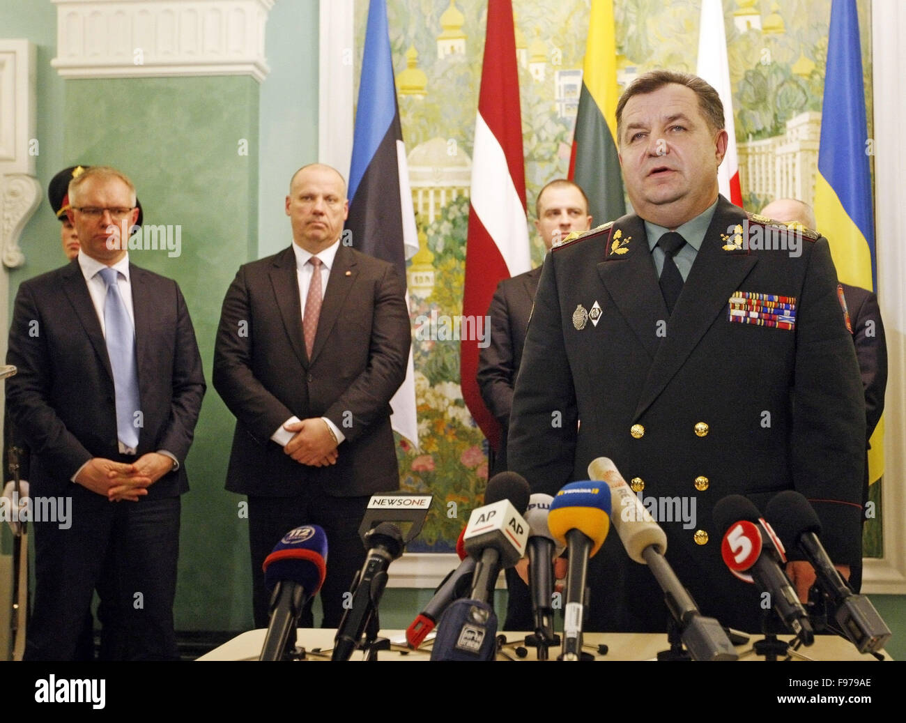 Kiev, Ukraine. 14th Dec, 2015. From left to right: Estonian Defence Minister Hannes Hanso, Latvian Defence Minister Raimonds Bergmanis, Polish Deputy Defence Minister Tomasz Szatkowsk and Ukrainian Defence Minister Stepan Poltorak speaks with the media after the signing of the Joint Statement of the Ministers of Defence of Ukraine, Poland, Estonia, Latvia, and Lithuania on the basis of the joint working meeting on the development of cooperation in the defense sphere. © Vasyl Shevchenko/Pacific Press/Alamy Live News Stock Photo