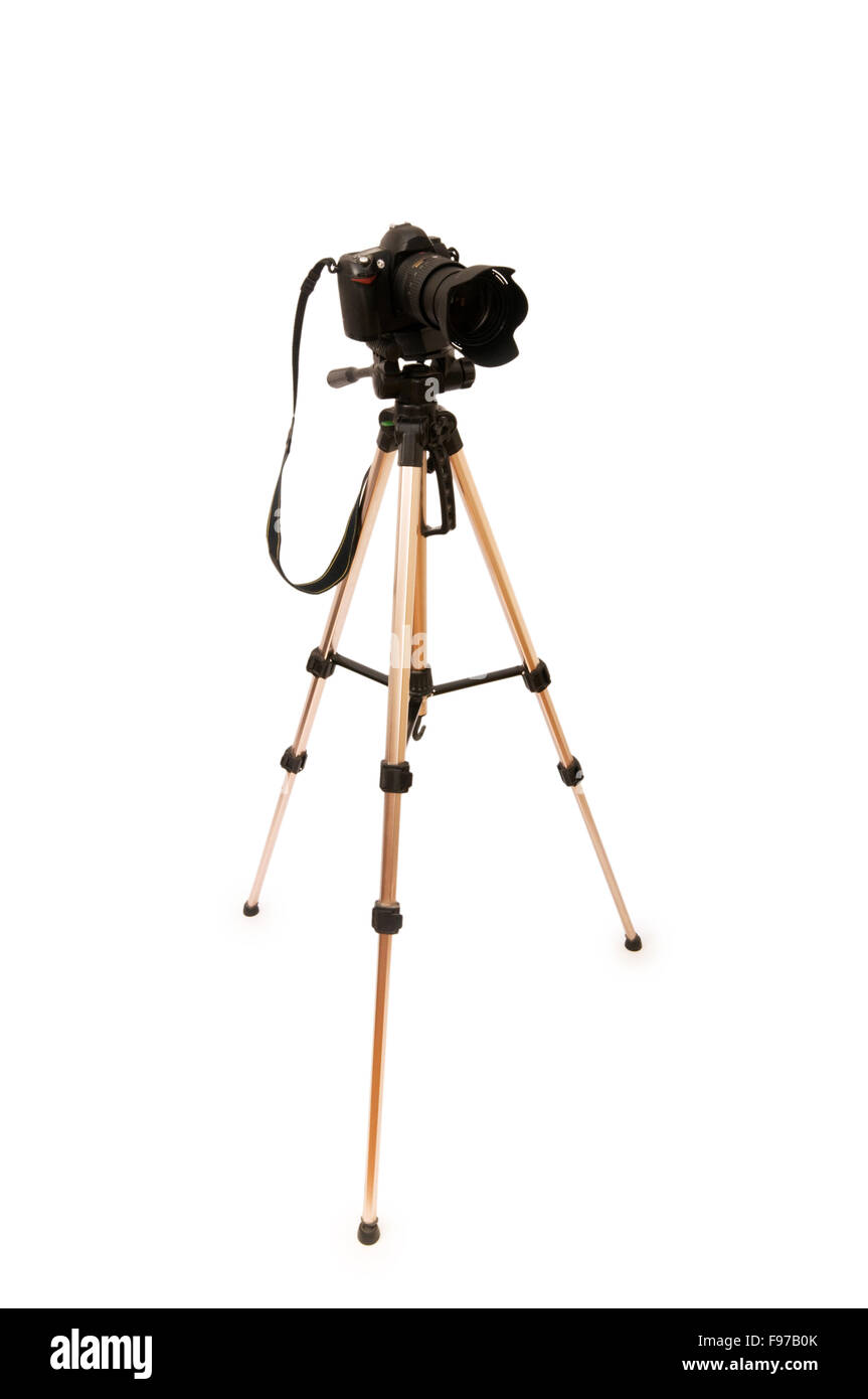 Tripod and camera isolated on the white background Stock Photo - Alamy