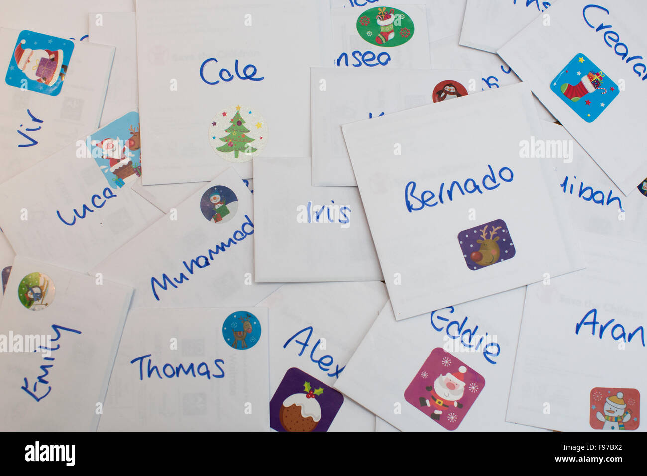 Christmas cards addressed to a child's classmates and school friends, UK Stock Photo