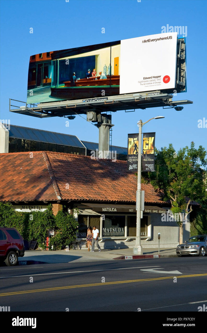 A fine art painting by Edward Hopper is reproduced on a large commercial billboard over Ventura Blvd. in the San Fernando Valley area of Los Angeles, California during the Art Everywhere event. Stock Photo