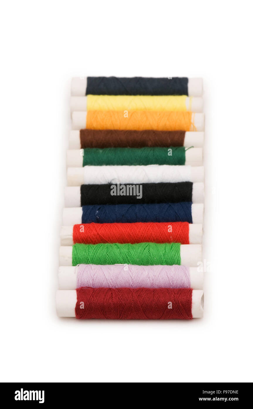 Thread spools isolated on the white background Stock Photo - Alamy