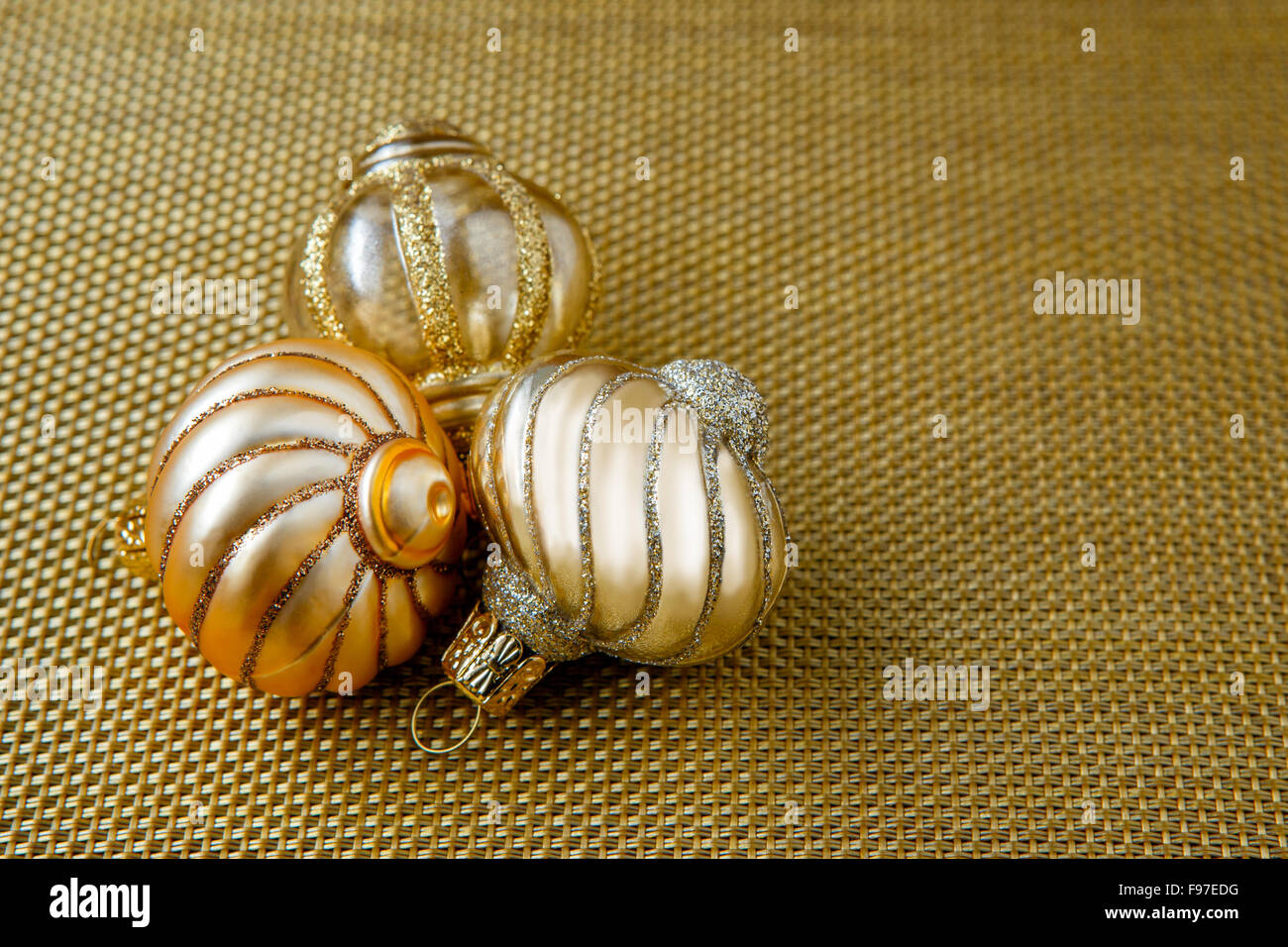 Christmas decoration on gold background Stock Photo - Alamy
