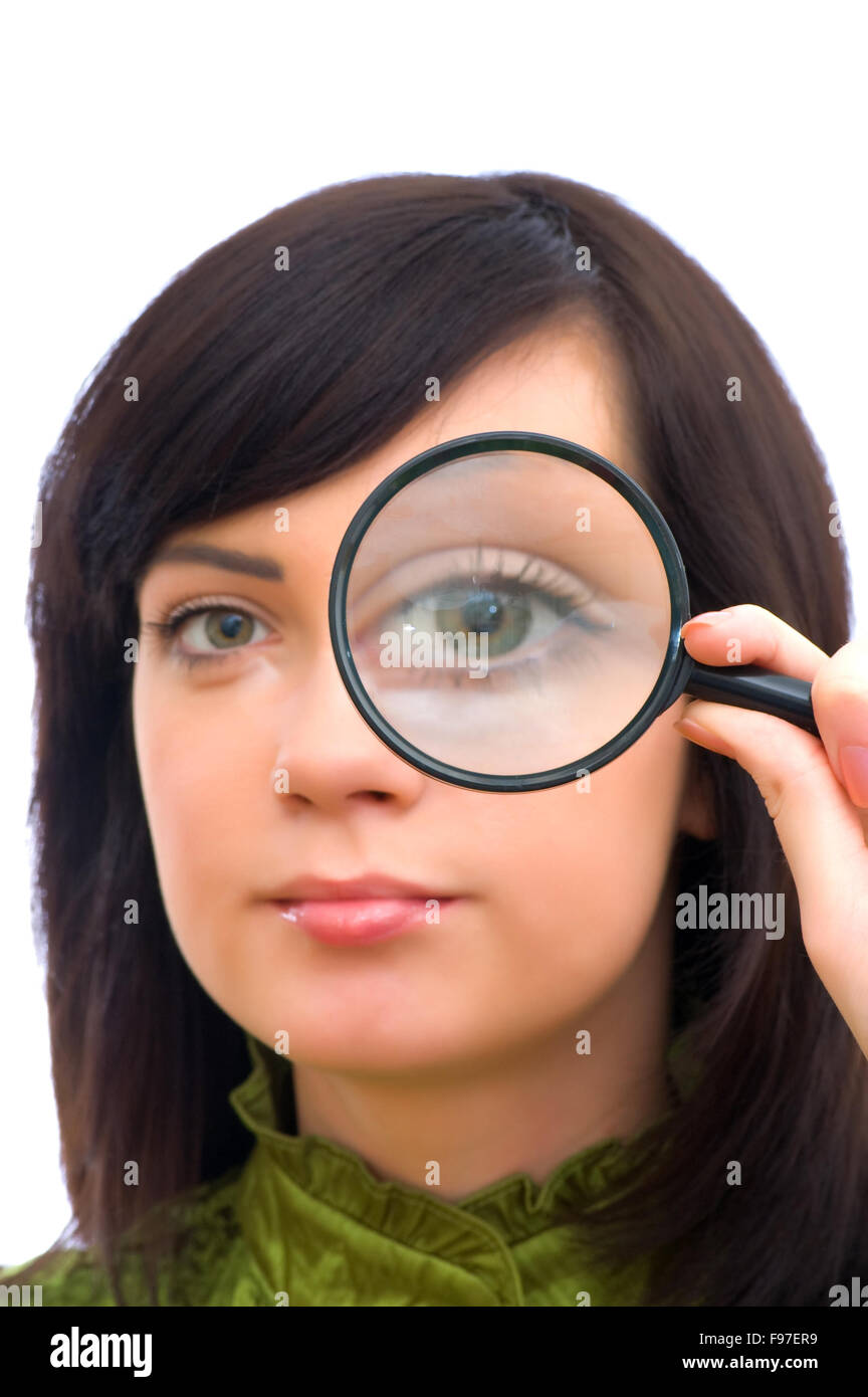 Girl's eye magnified through magnified glass on white Stock Photo Alamy