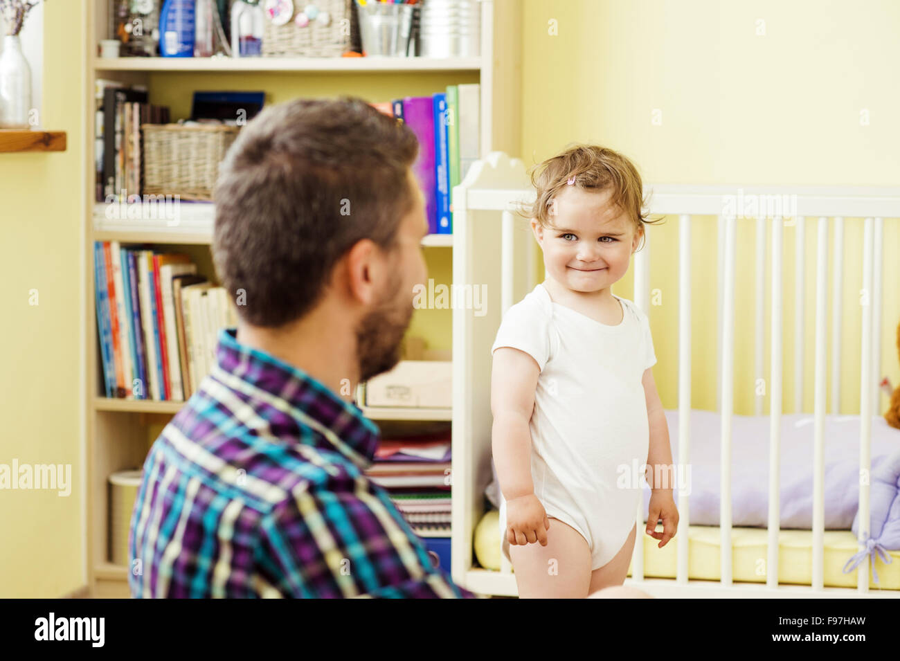happy father and his little daughter playing at home Stock Photo - Alamy