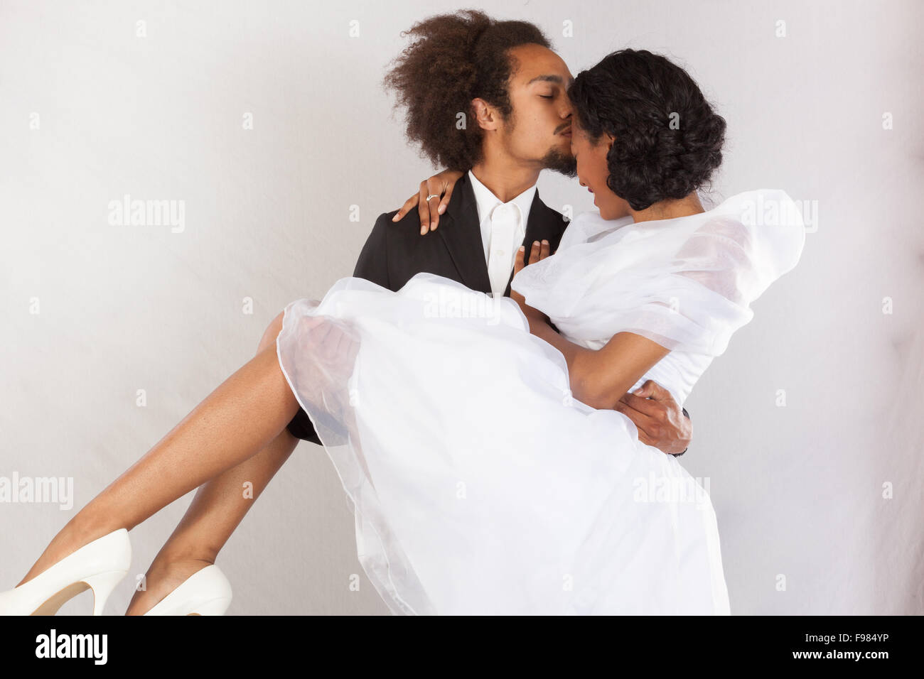 Cute african couple holding hi-res stock photography and images - Alamy