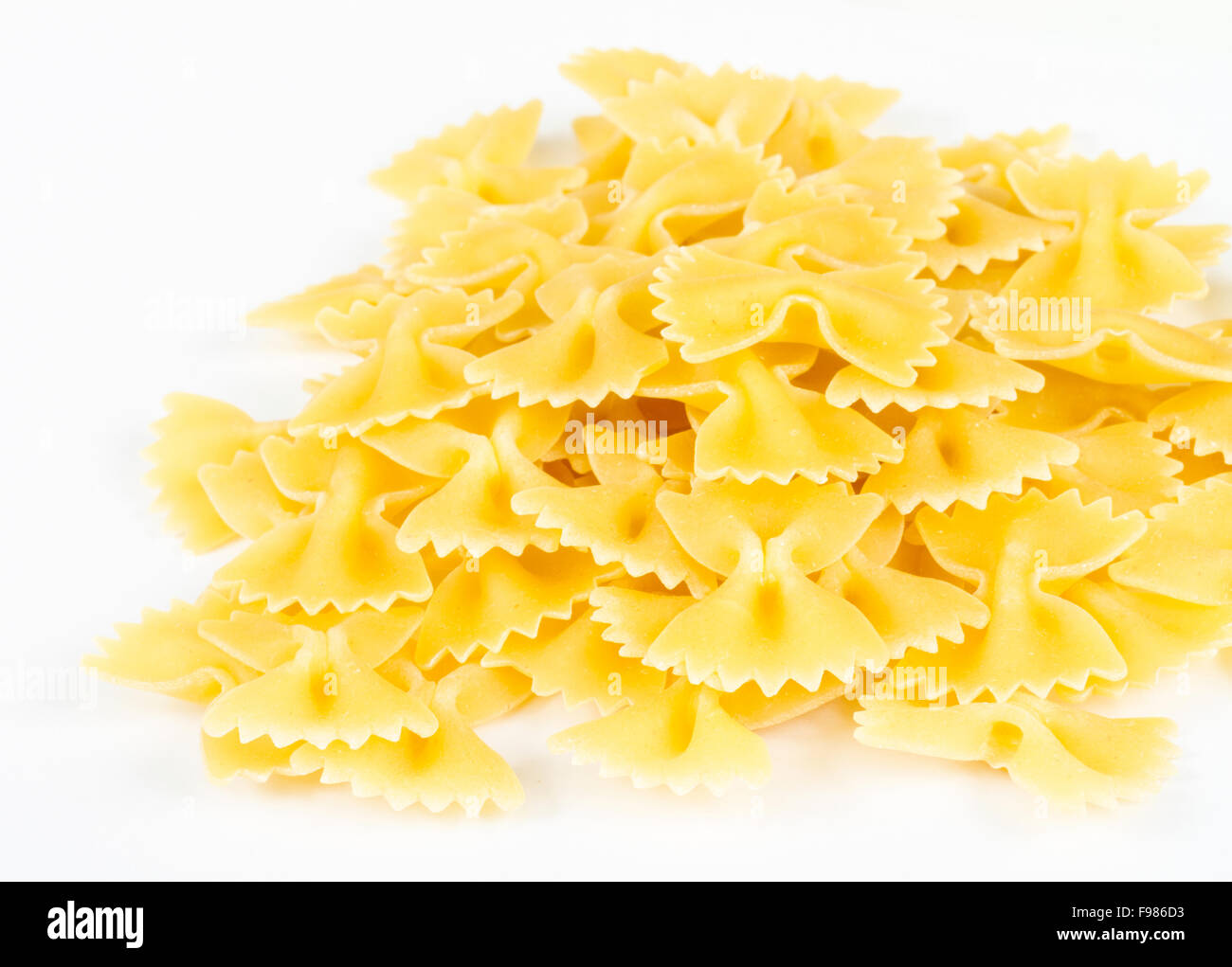 Farfalle pasta, isolated Stock Photo - Alamy