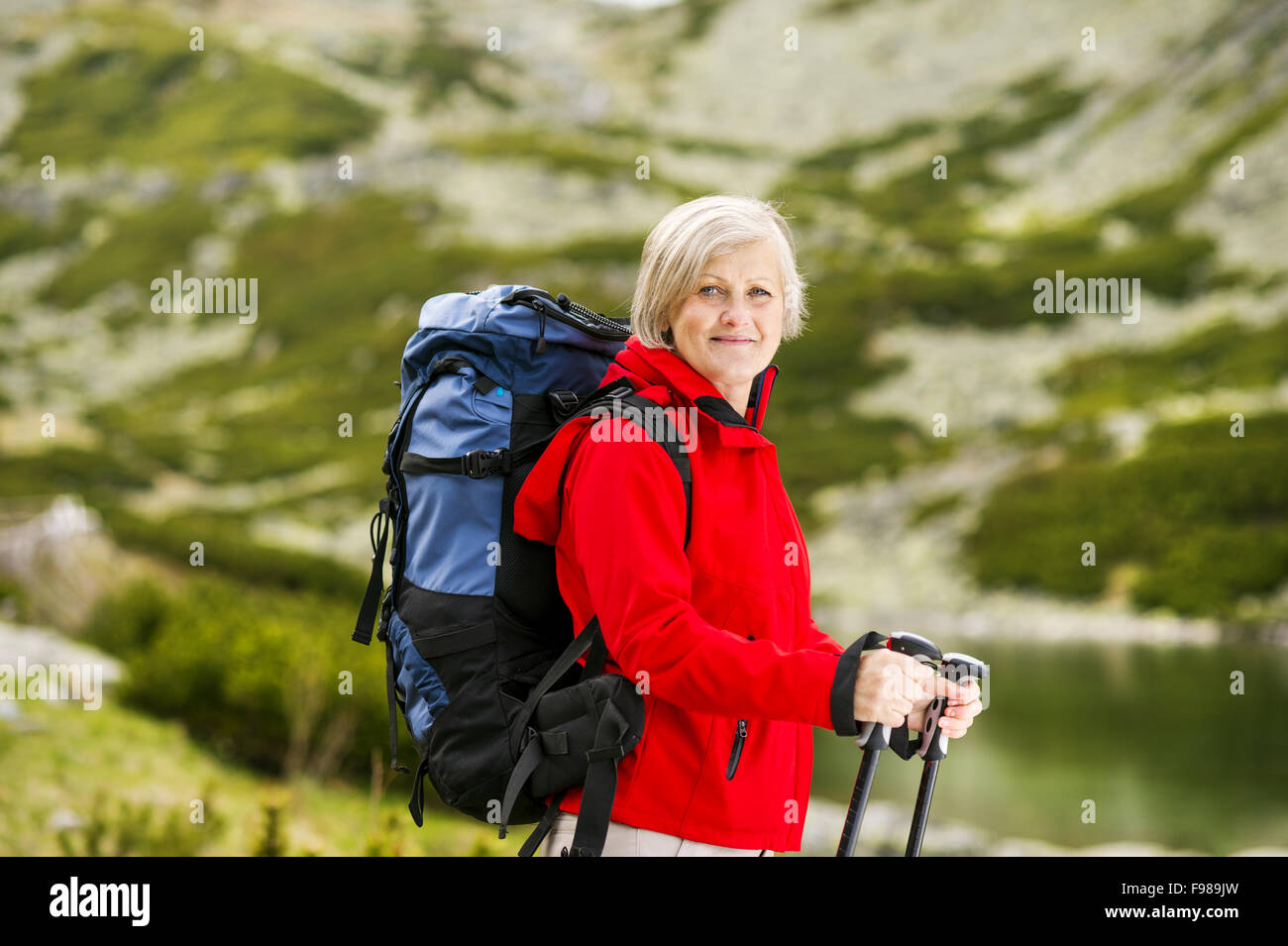 Beautiful woman hiking hi-res stock photography and images - Alamy