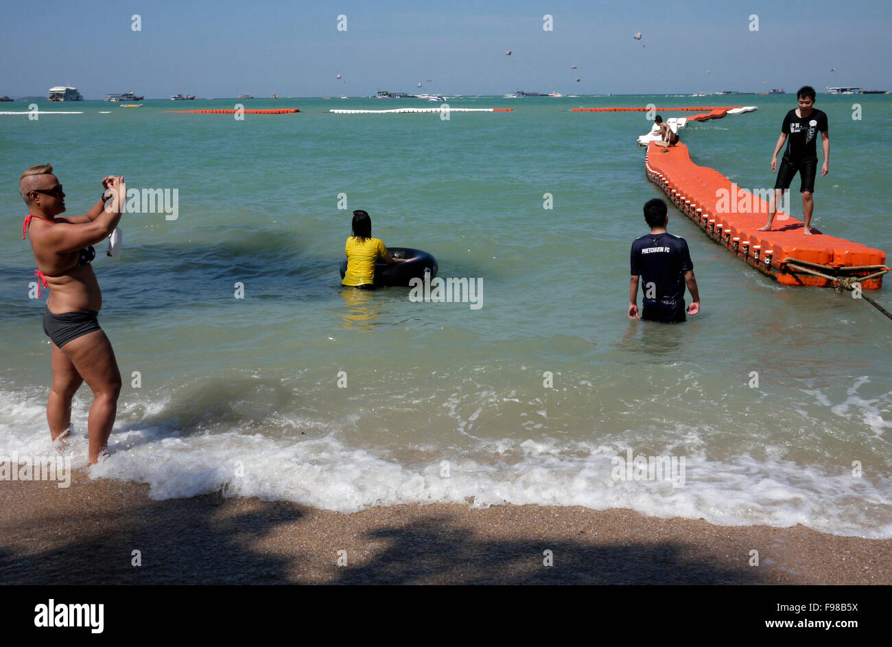 A safe swimming area is marked out by linked floaters / buoys on Pattaya beach Thailand to protect swimmers from jet skis etc Stock Photo