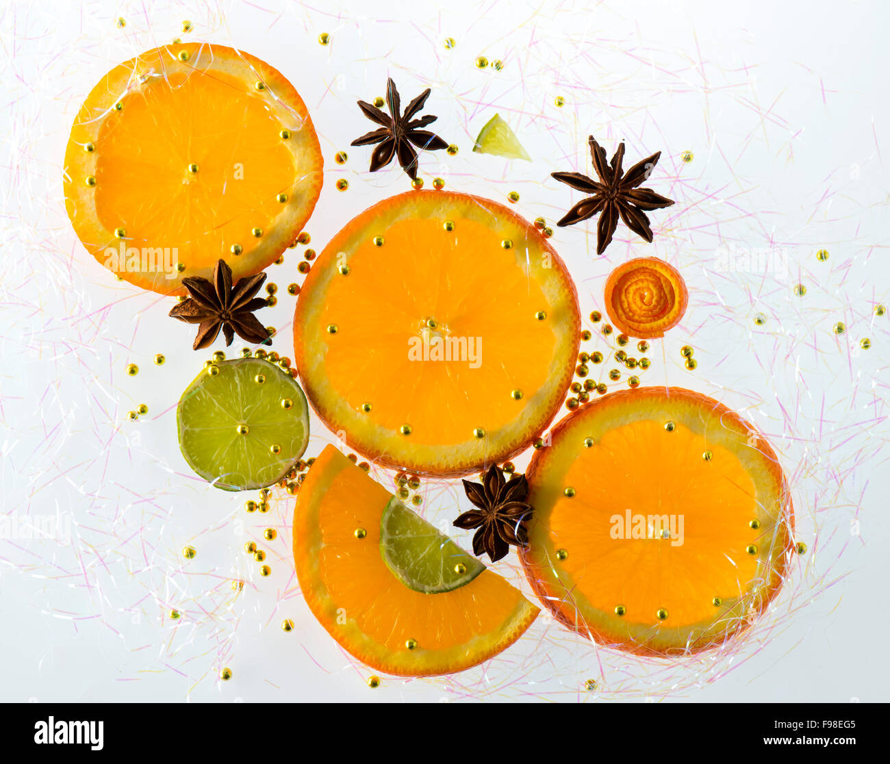 Orange and lemon slice with star anise and golden sugar perls christmas decoration Stock Photo
