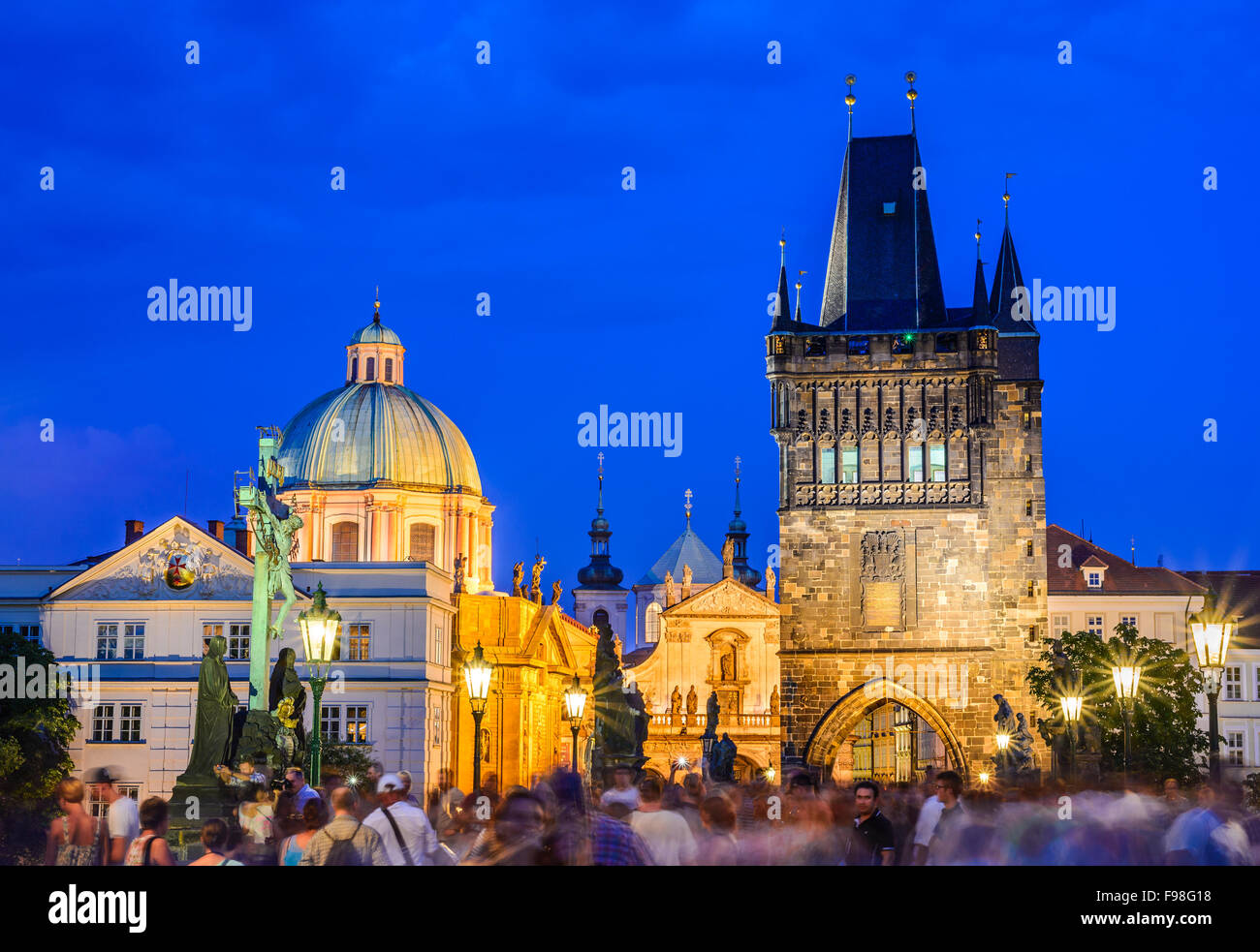 Prague, Czech Republic. Charles Bridge and Stare Mesto Old Town Tower. Twilight image of Bohemia capital. Stock Photo