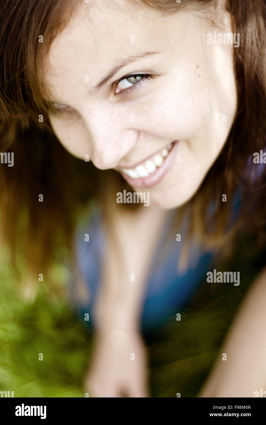 Close-up portrait of beautiful woman relaxing in nature Stock Photo - Alamy