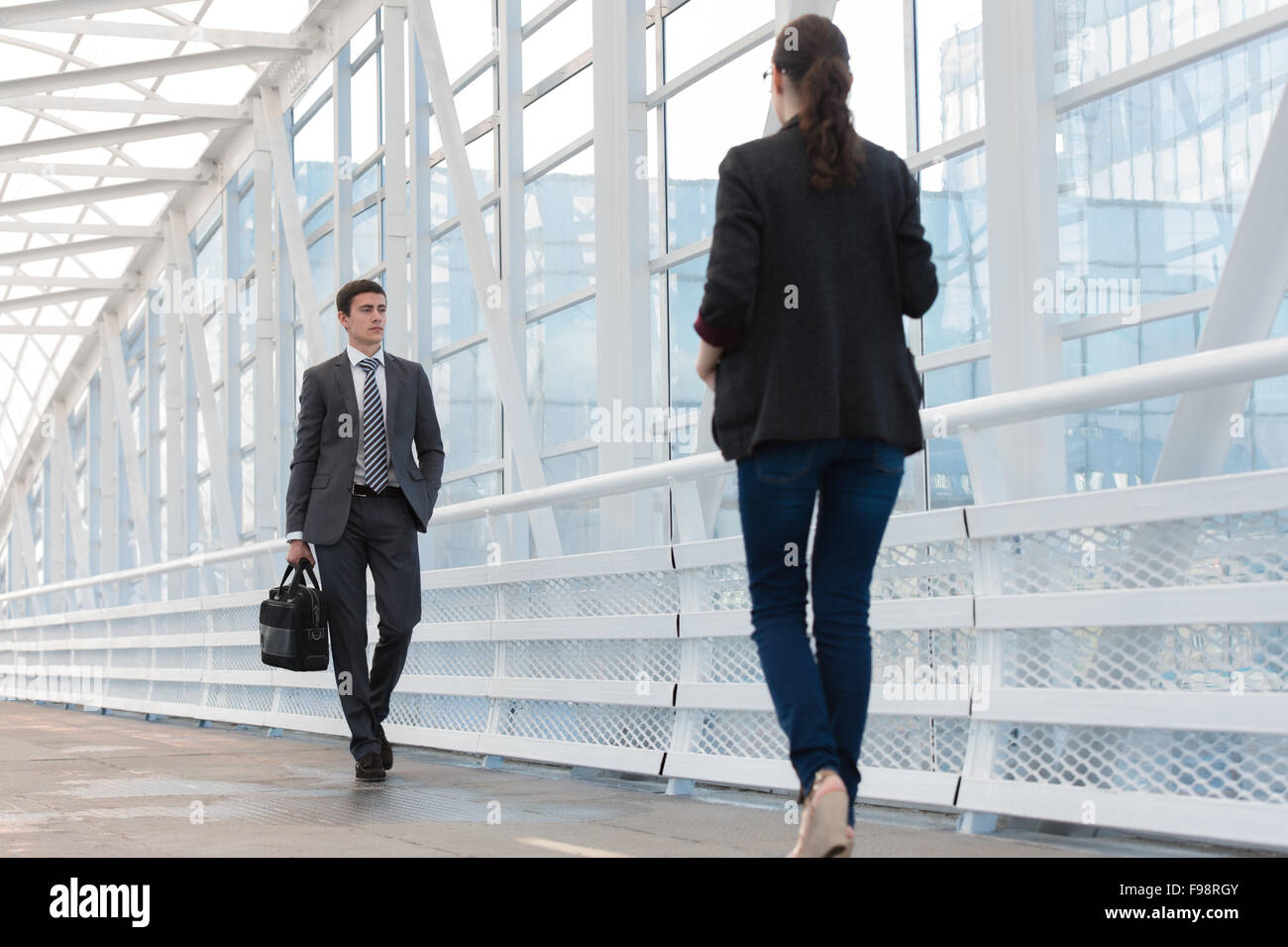 Business people walking hi-res stock photography and images - Alamy