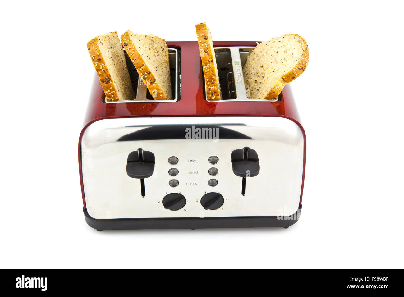 Modern toaster with bread slices on white background Stock Photo