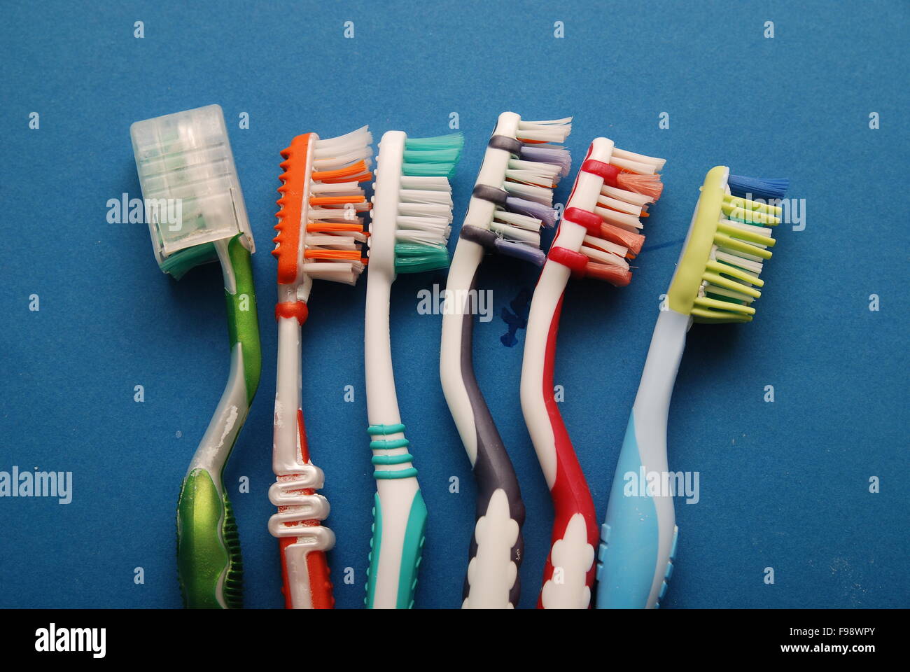 teeth brush on blue background Stock Photo - Alamy