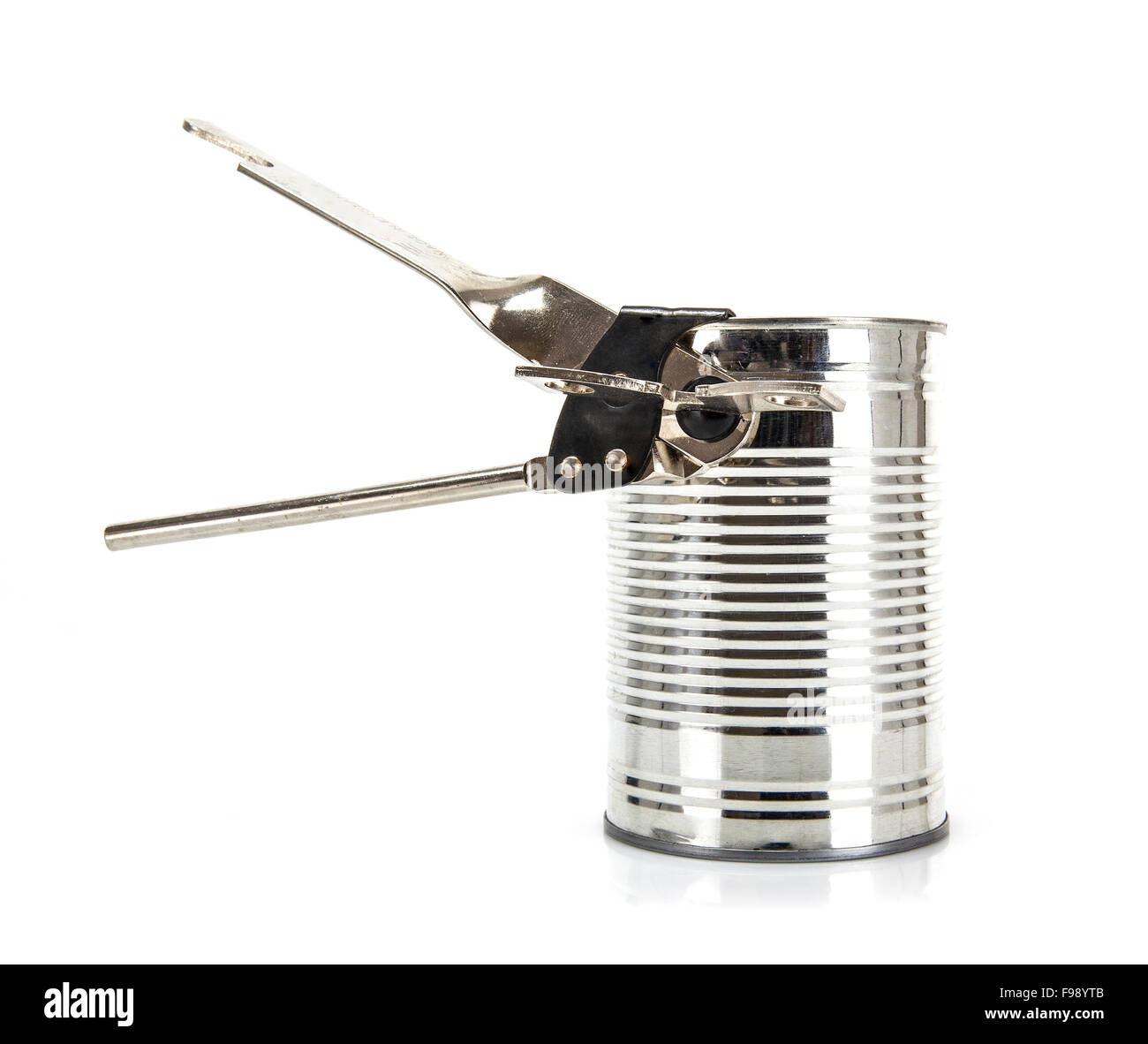 Old style tin opener opening a can, isolated on white background Stock  Photo - Alamy
