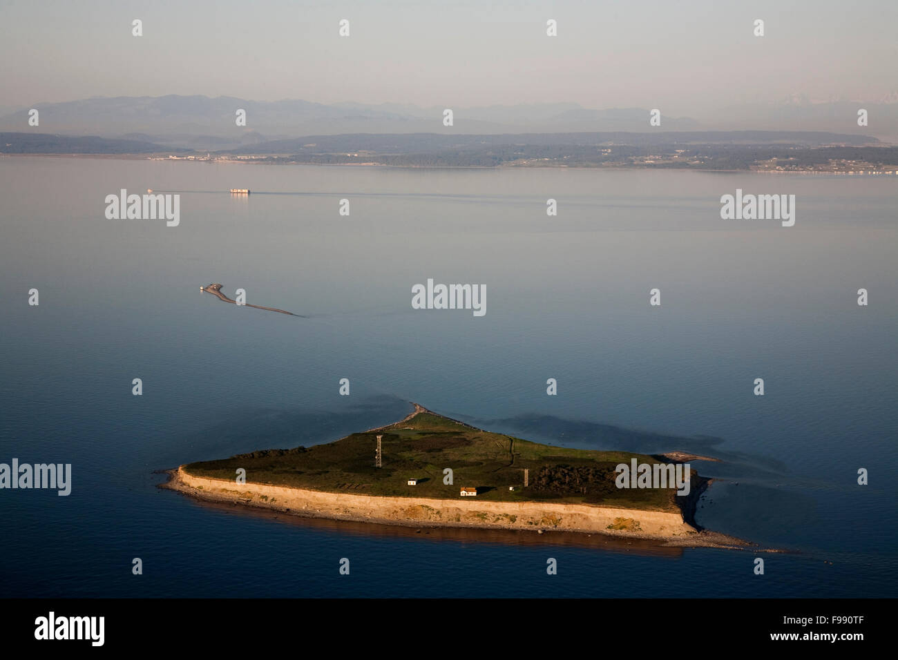 Aerial views of the many islands off the coast of Washington State at dusk. Stock Photo