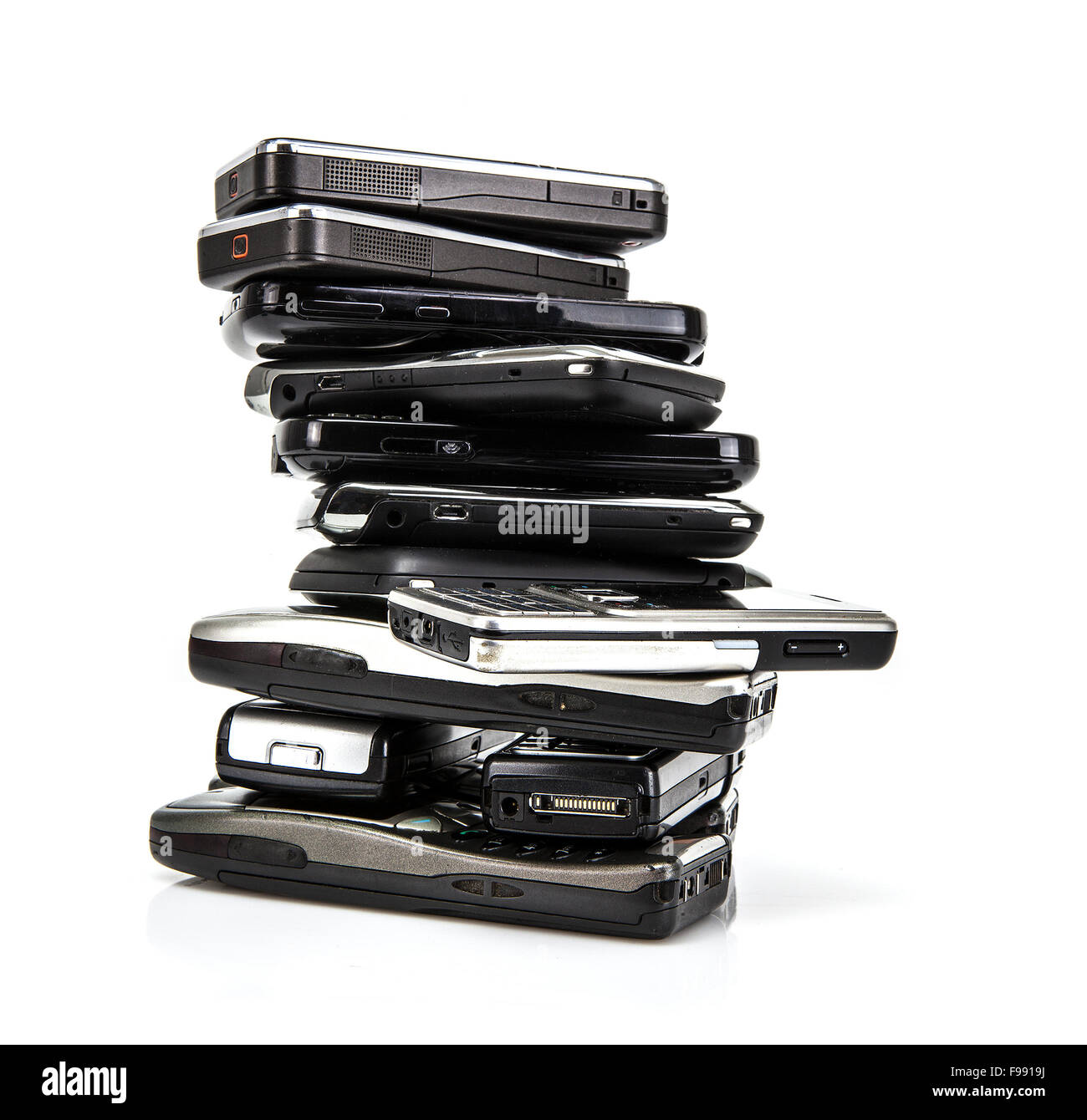 Pile of old mobile phones ready for recycling Stock Photo