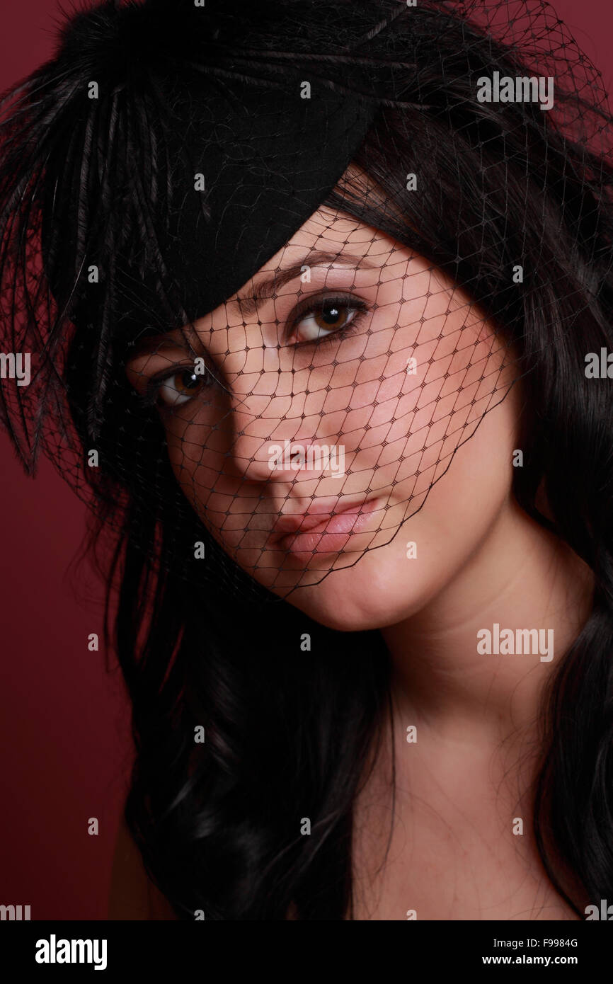 Young woman black hat veil hi-res stock photography and images - Alamy