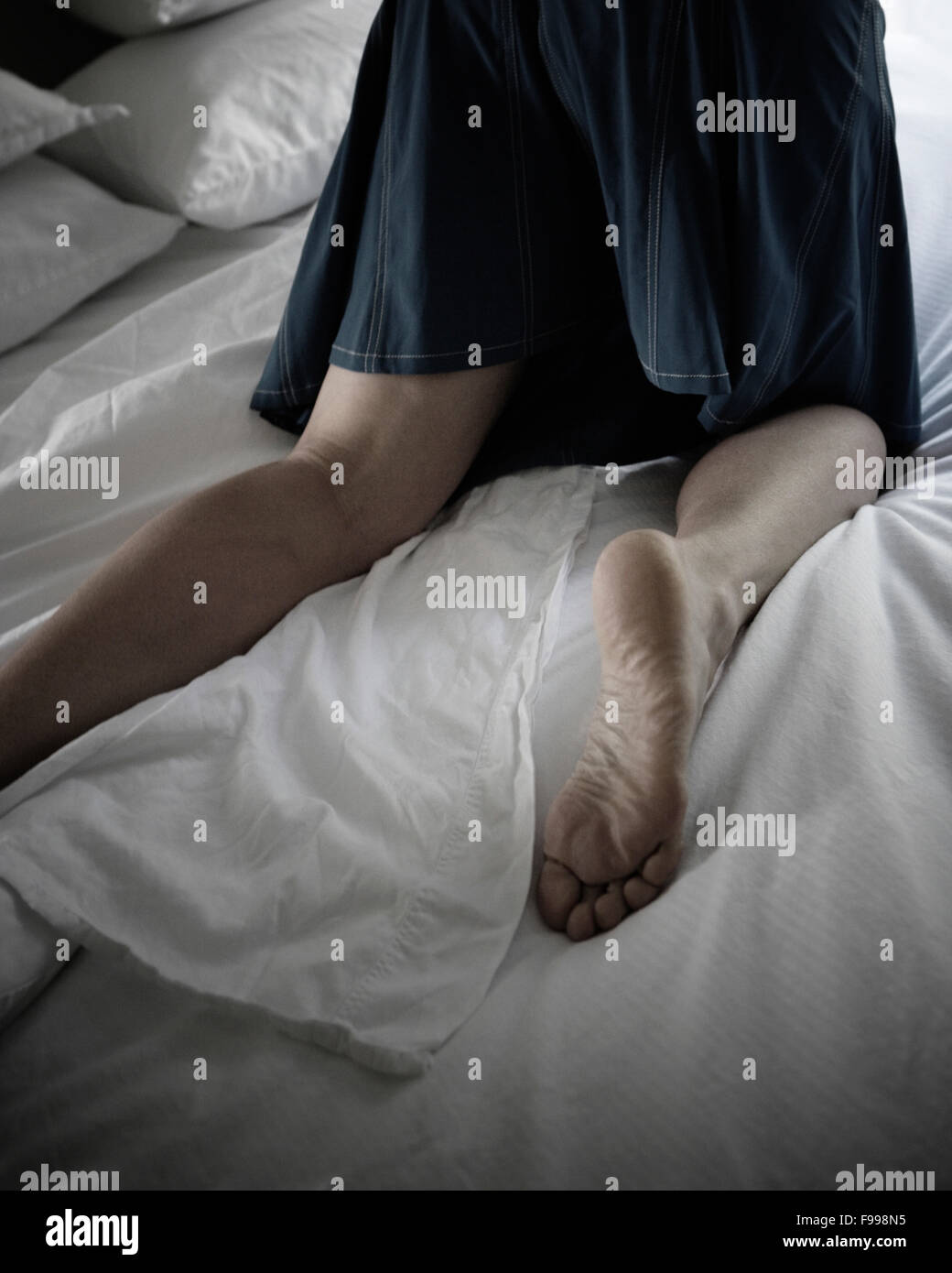 Woman wearing dress kneeling on hi-res stock photography and images - Alamy