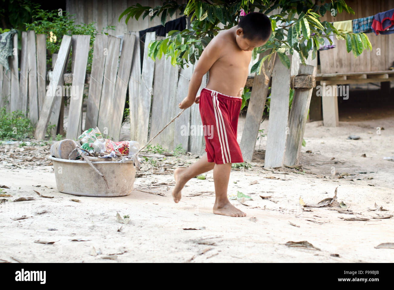 Kid in a Shipibo tribe village Charashmana, Amazon, Peru Stock Photo