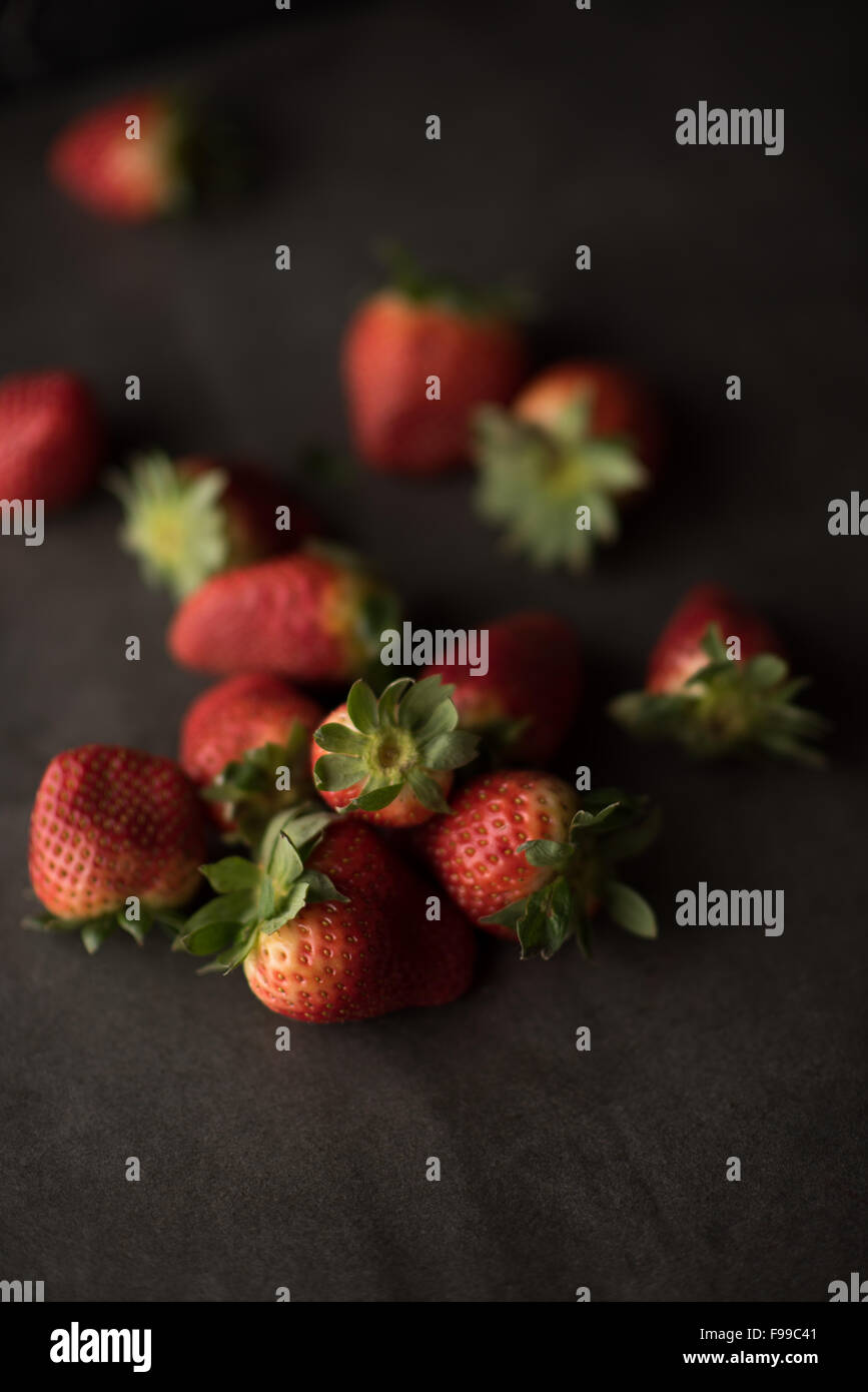 Strawberry on stone background Stock Photo - Alamy