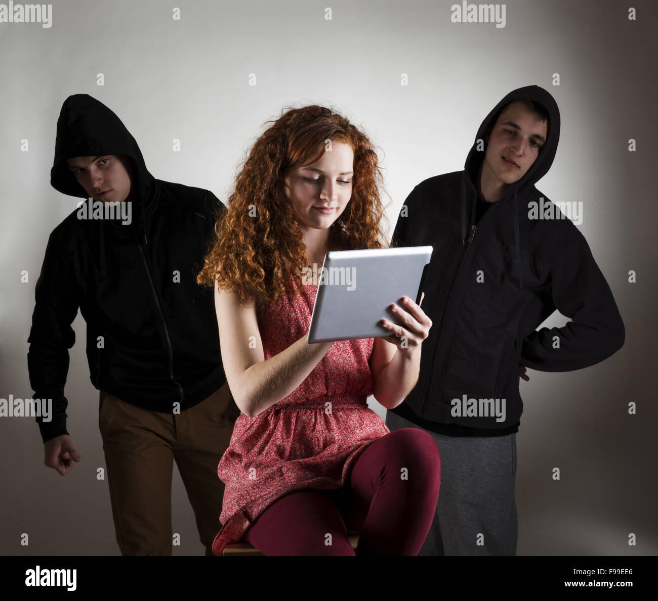 Concept of potential internet danger with teen girl and man in disguise Stock Photo
