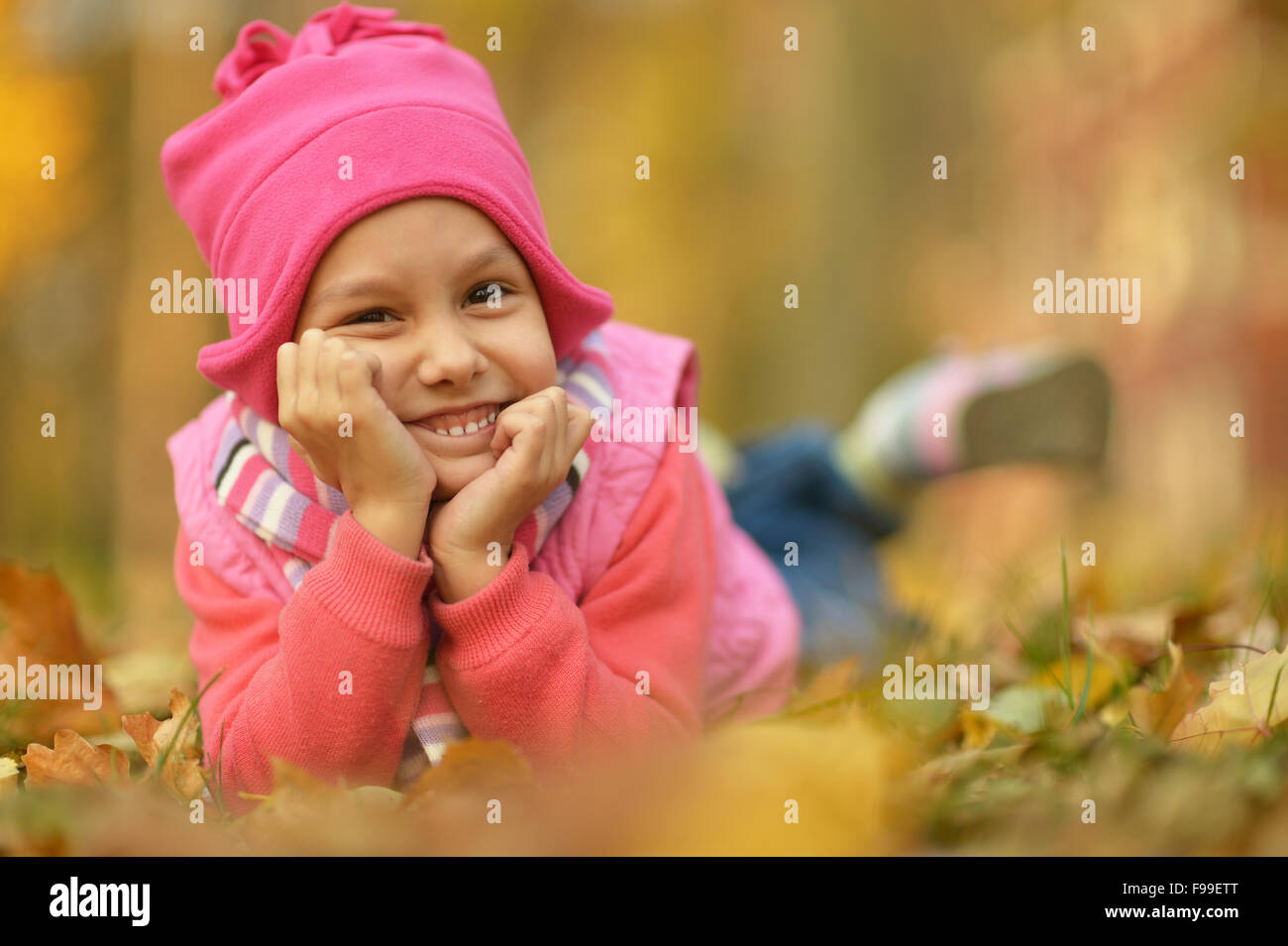 Girl in autumn park Stock Photo - Alamy
