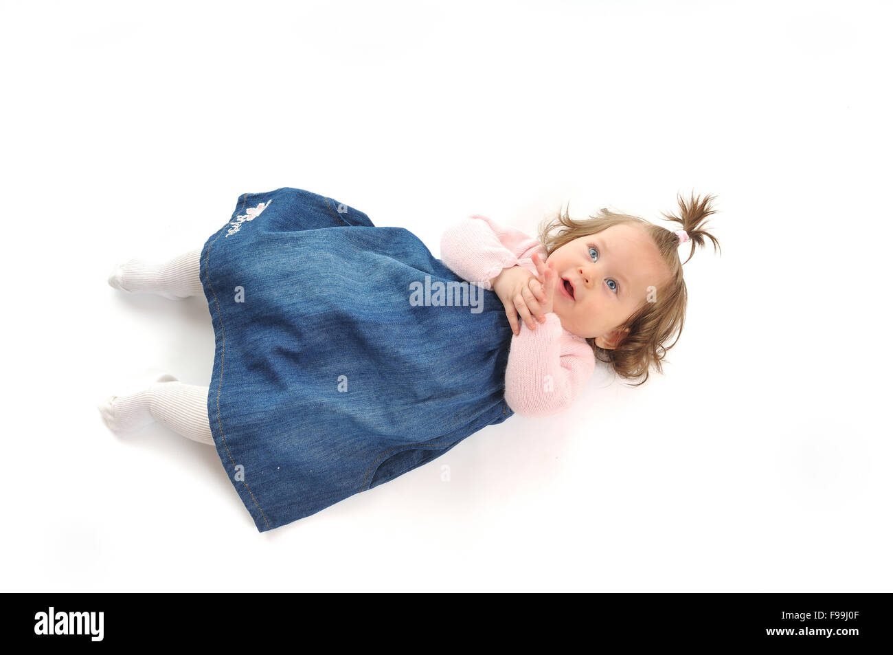 one happy baby child isolated on white background Stock Photo - Alamy