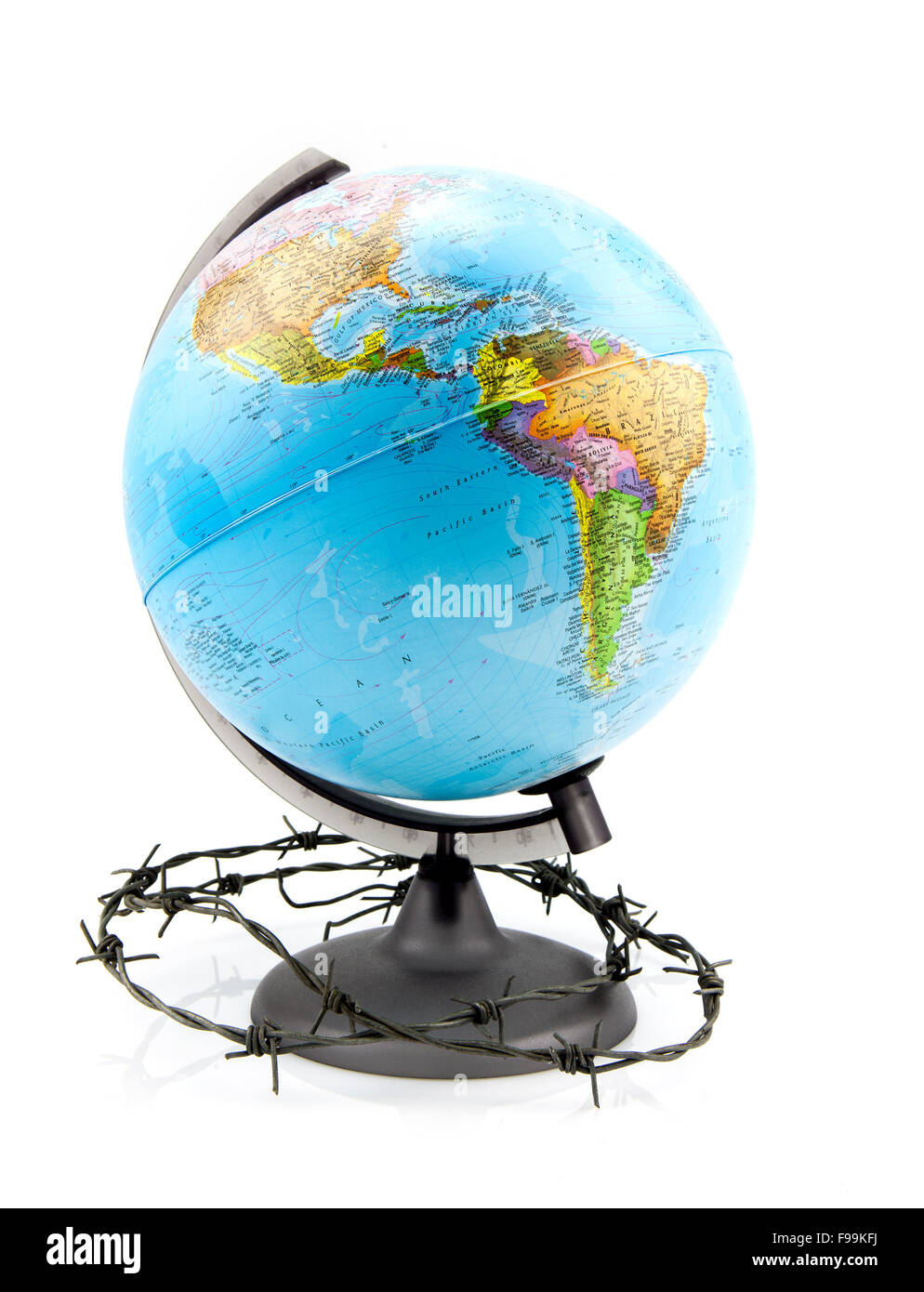World globe surrounded by barbed wire - World security concept Stock Photo