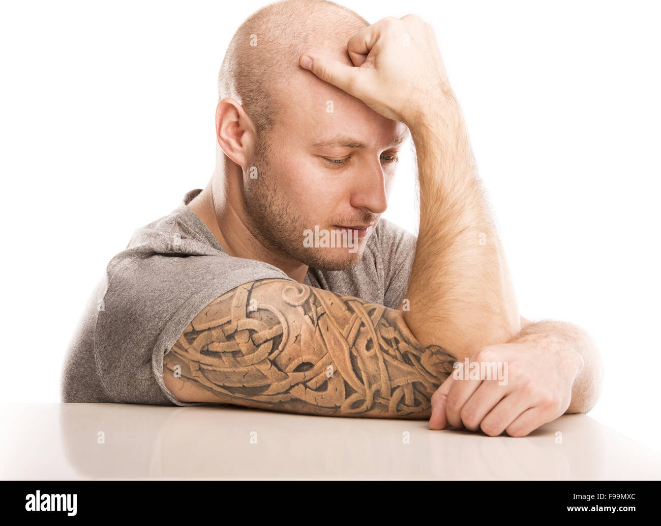 Handsome young man with tattoo, isolated on white. Stock Photo