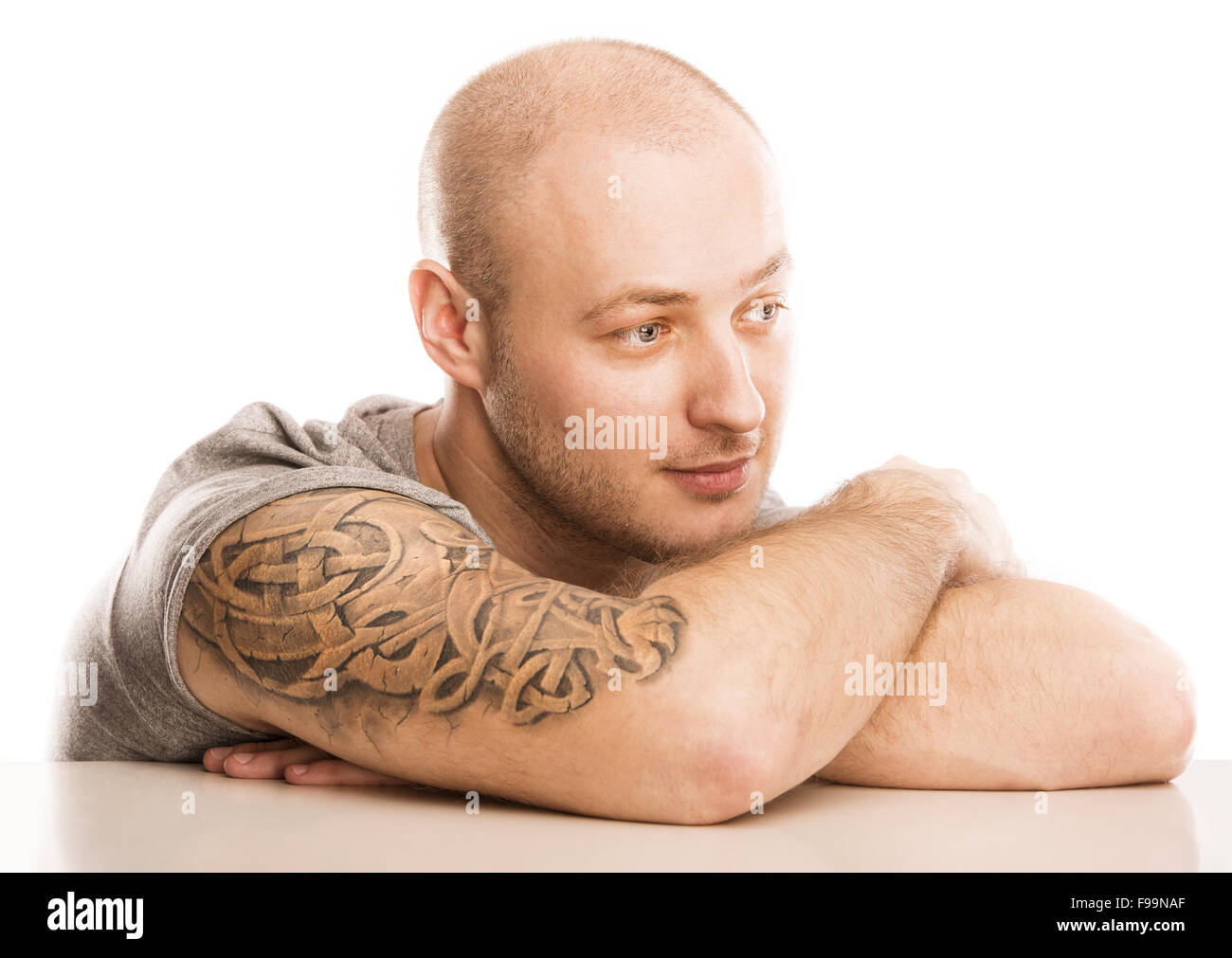 Handsome young man with tattoo, isolated on white Stock Photo - Alamy