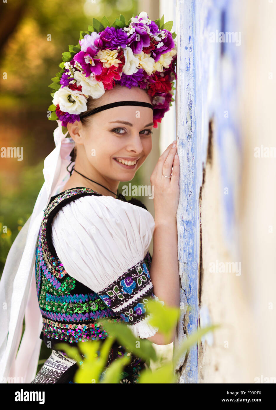 Beautiful woman wearing traditional Eastern Europe folk costumes. Stock Photo