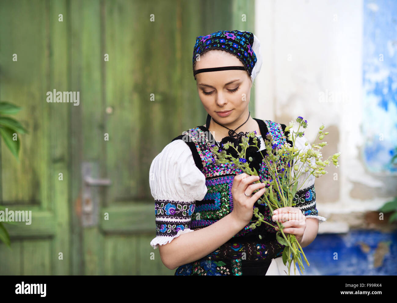 Beautiful woman wearing traditional Eastern Europe folk costumes. Stock Photo