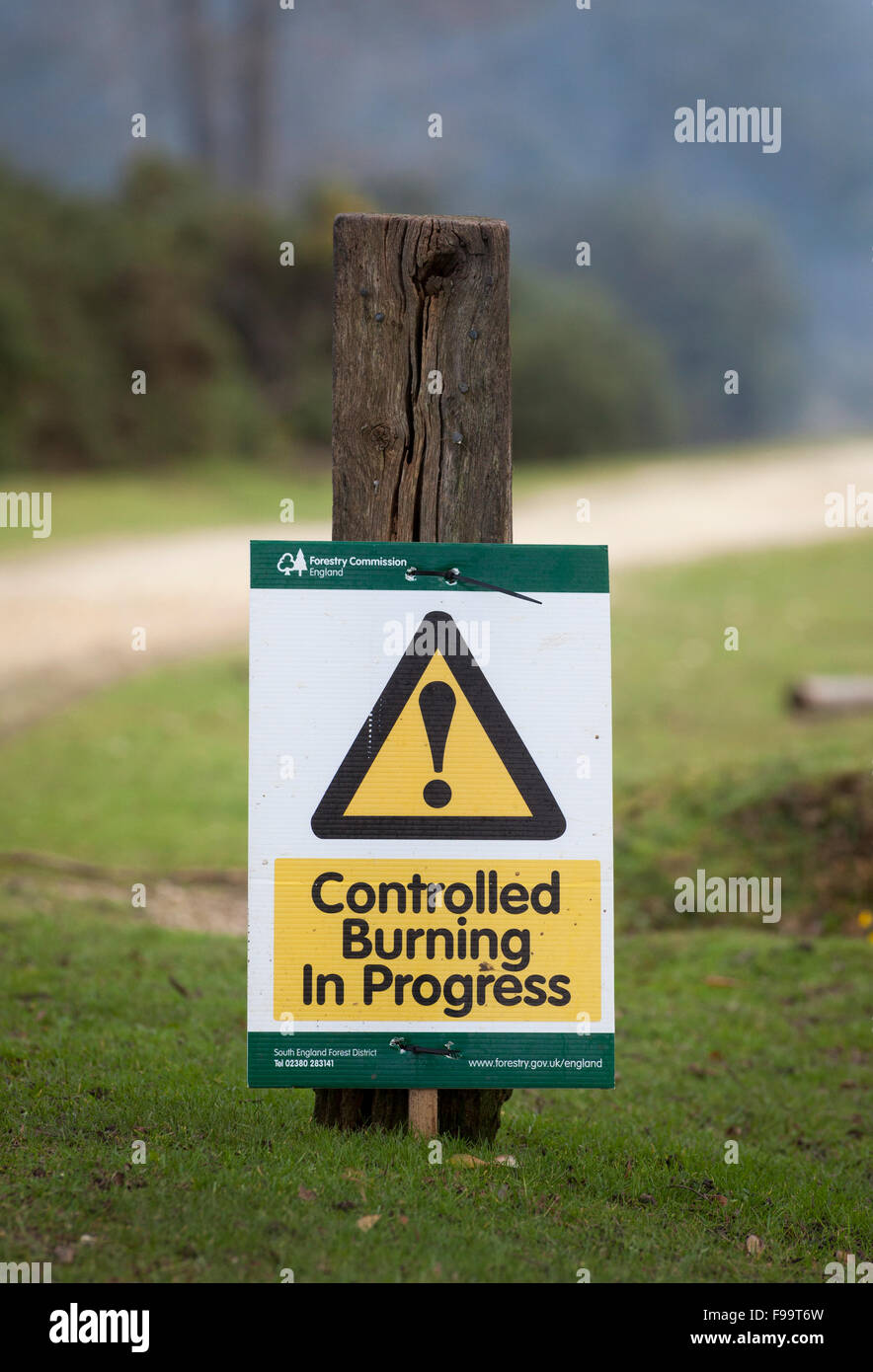 Controlled Burning in Progress sign in the New Forest Hampshire UK Stock Photo