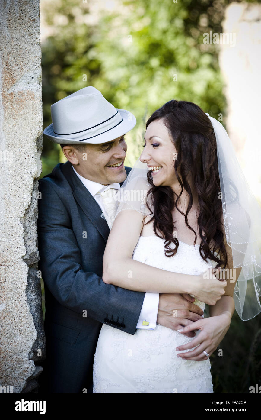 Happy bride and groom on their wedding day Stock Photo - Alamy