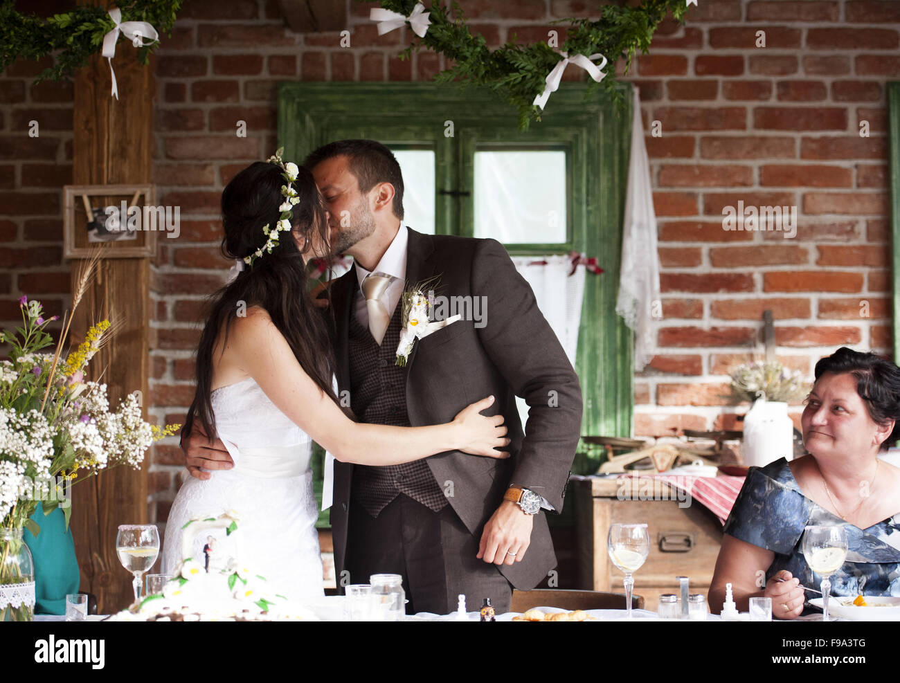 Bride and groom are at the wedding reception Stock Photo - Alamy