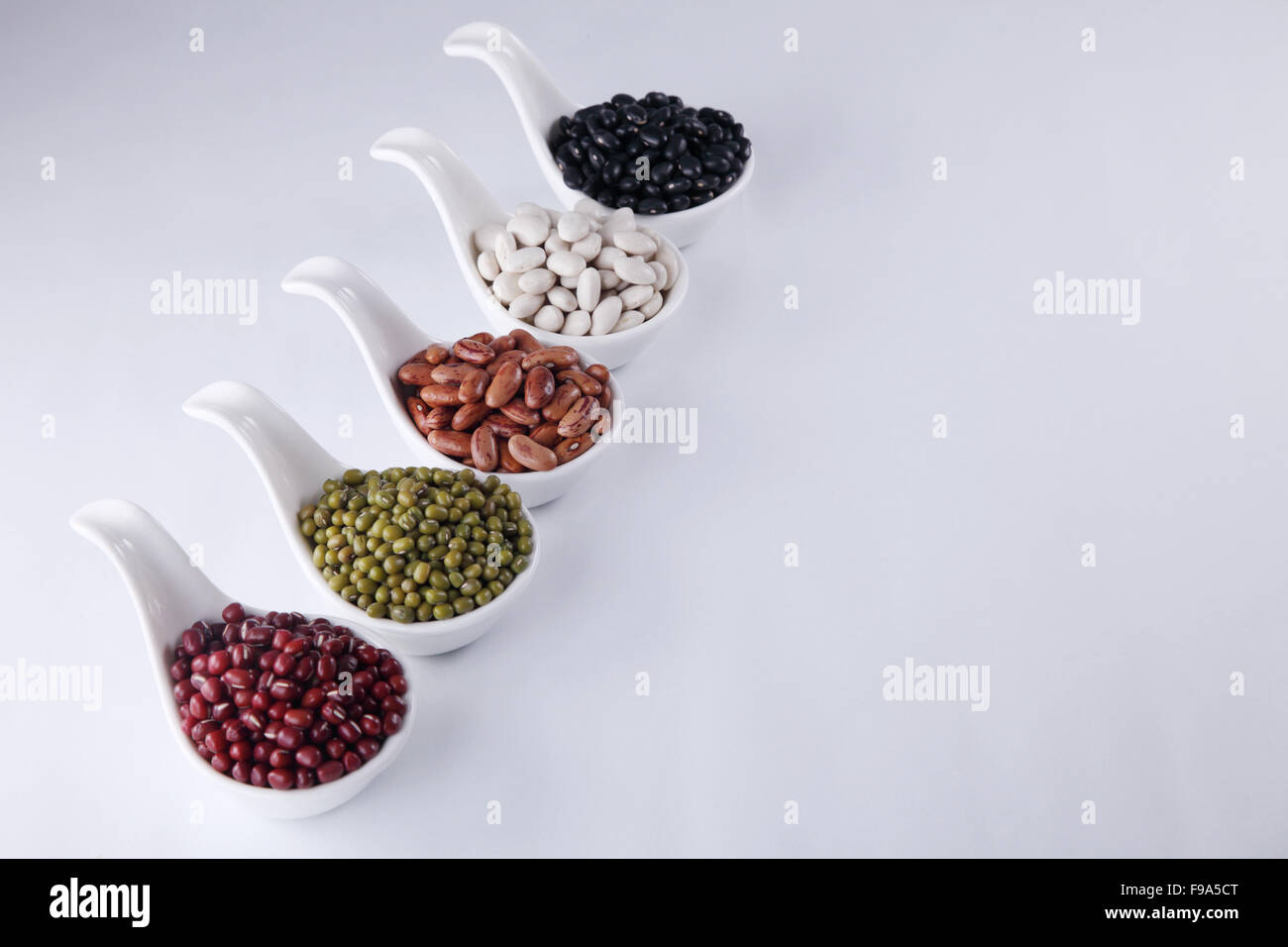 five different colour organic soup beans Stock Photo - Alamy