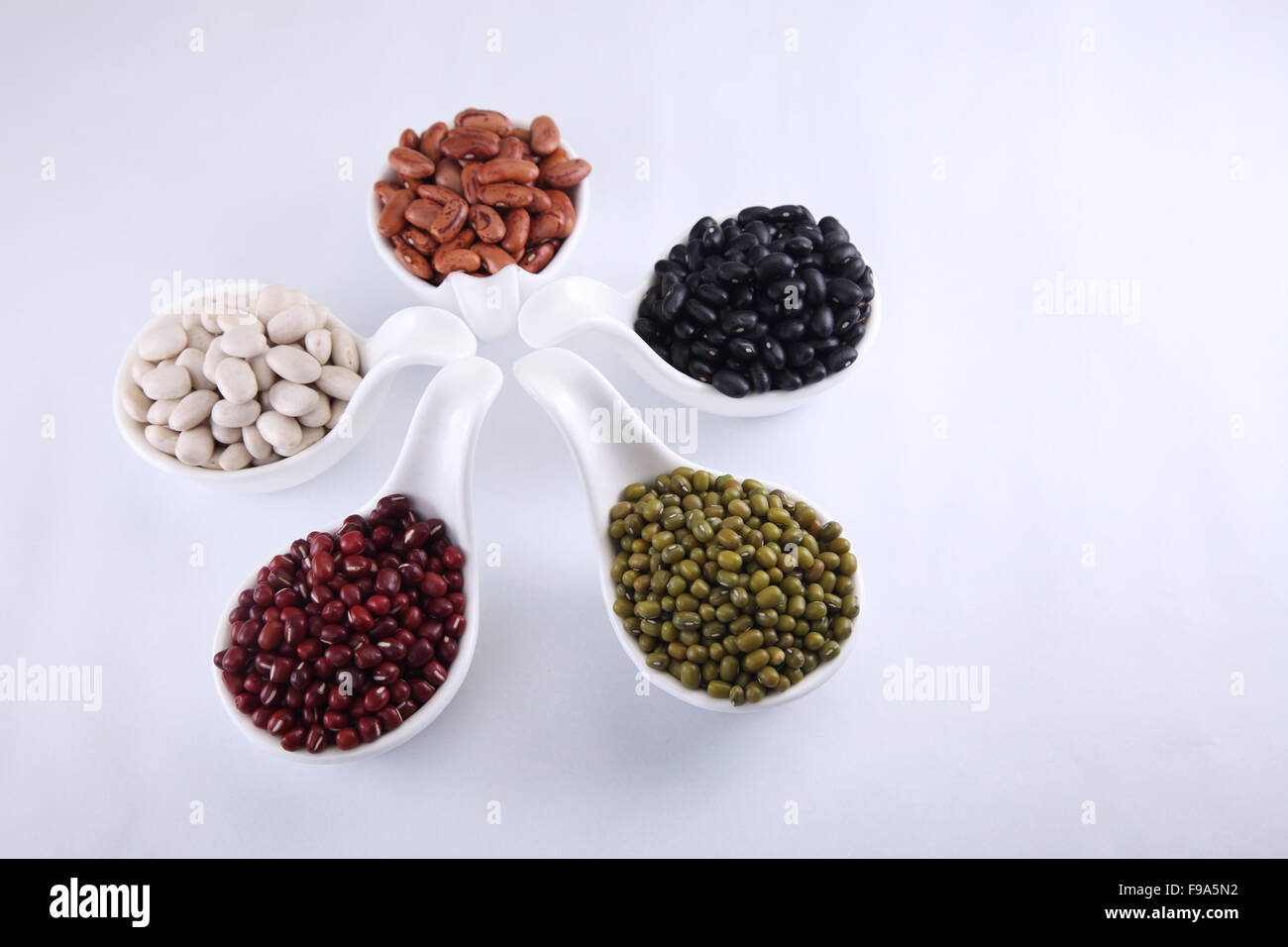 five different colour organic soup beans Stock Photo - Alamy