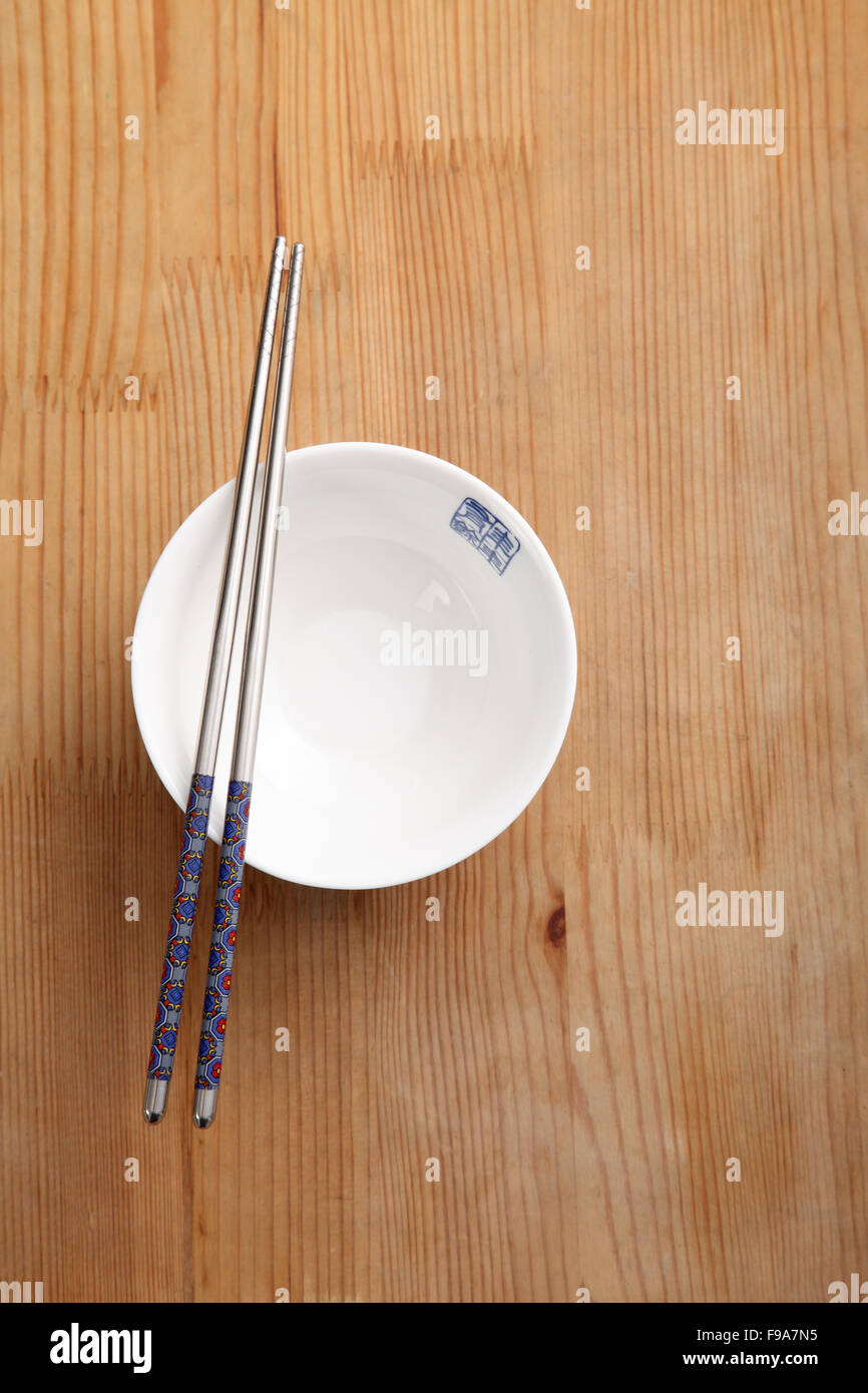empty chinese rice bowl with chopstick Stock Photo Alamy