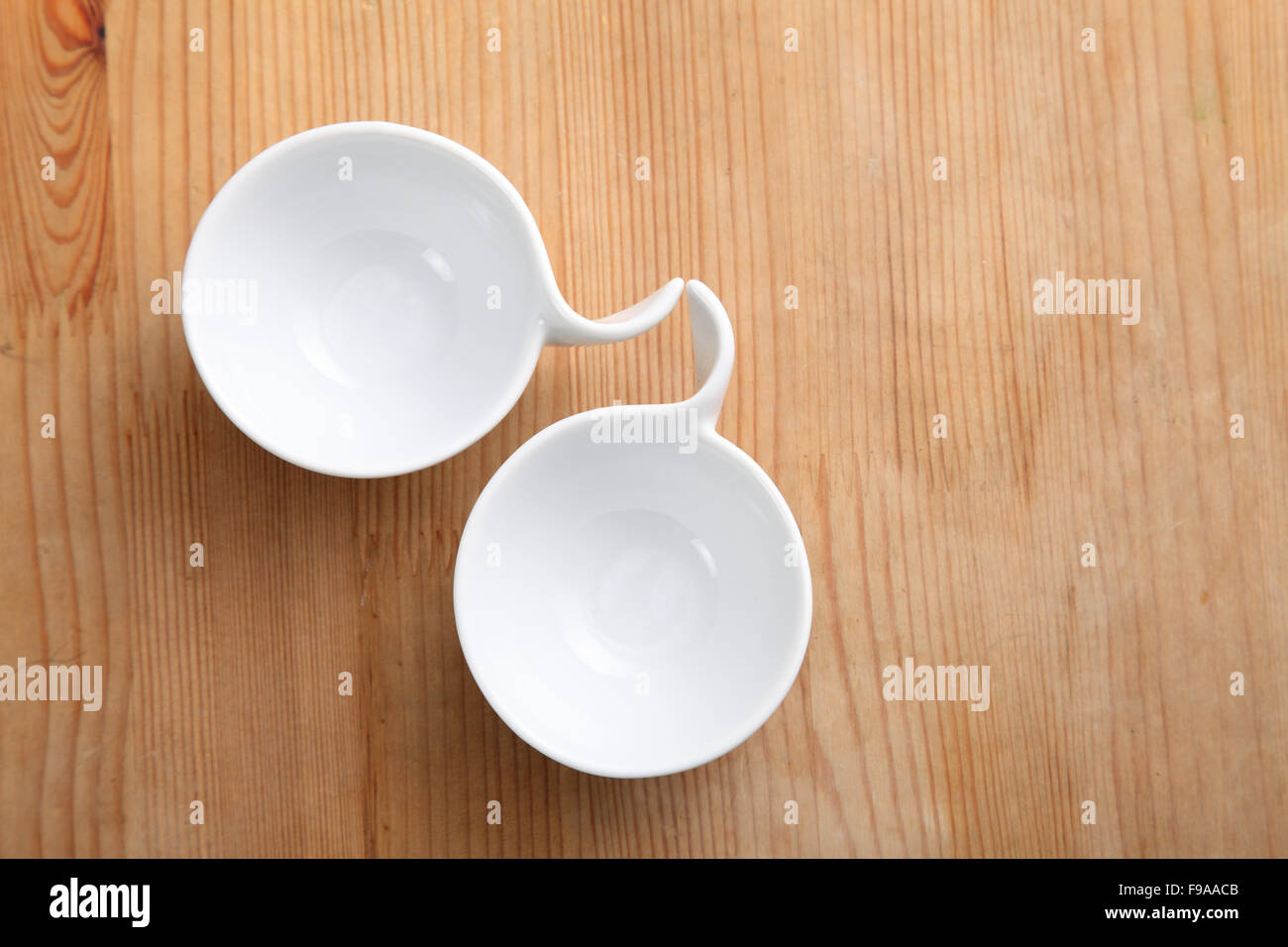 saucers on the wooden background Stock Photo Alamy