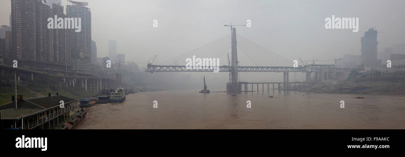 Unfinished bridge across Yangtze River - Chongqing, China Stock Photo